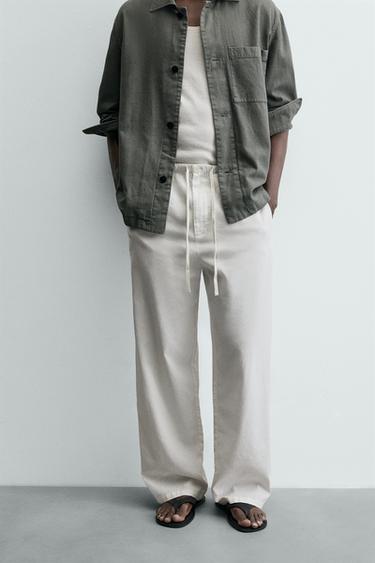 RELAXED FIT LINEN BLEND TROUSERS - White by Zara