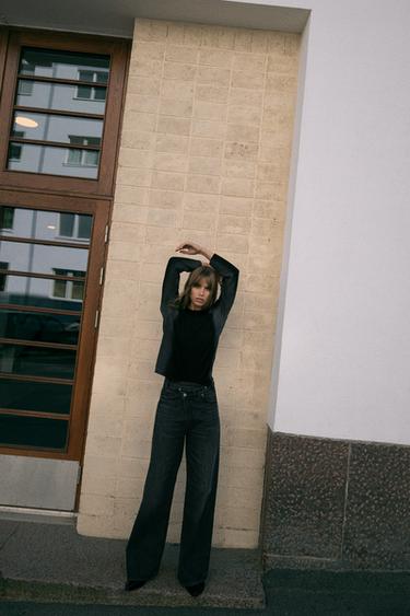JEANS TRF WIDE LEG CINTURA CRUZADA TIRO ALTO - أسود by Zara