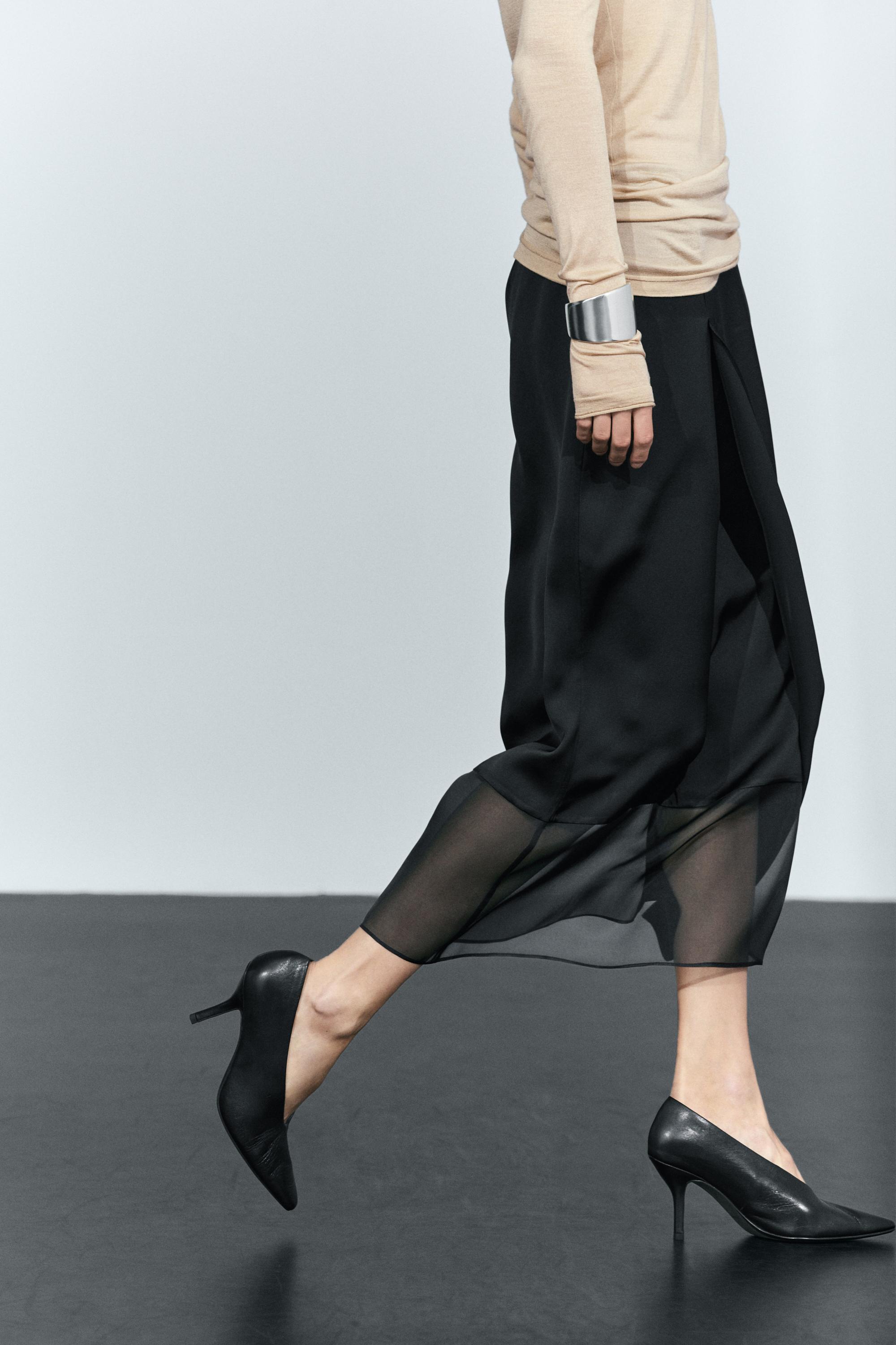 Jupe midi droite double coupe semi-transparente