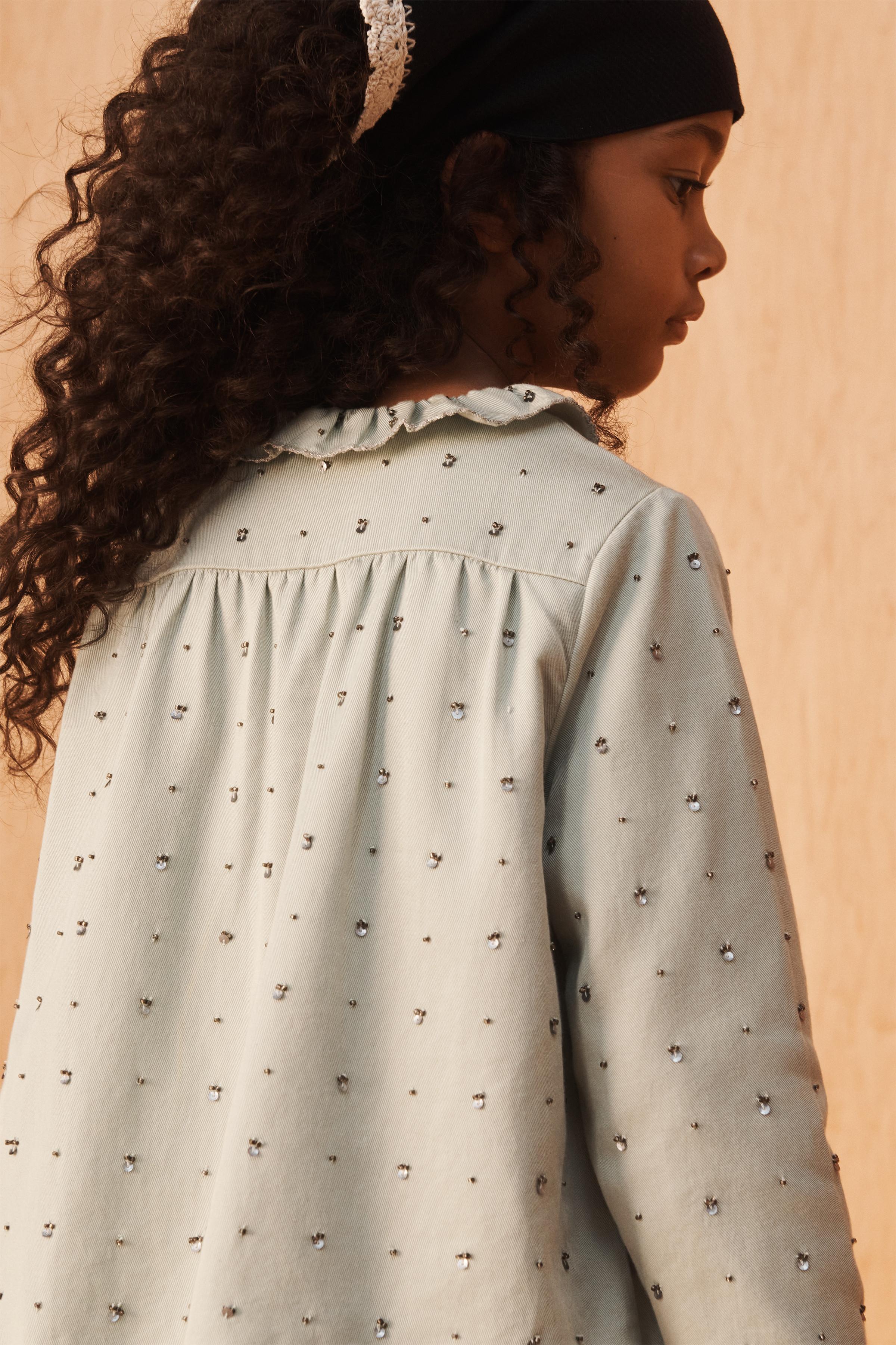 LIMITED EDITION SEQUIN RUFFLE NECK BLOUSE