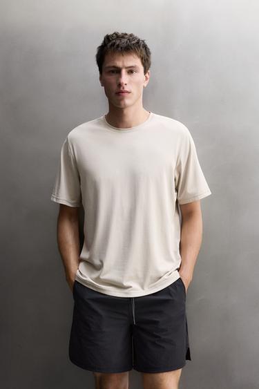 TECHNICAL TRAINING T-SHIRT — Dark camel 2