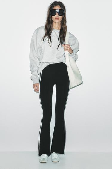 LEGGINGS FLARE BANDA LATERAL - Negro de Zara