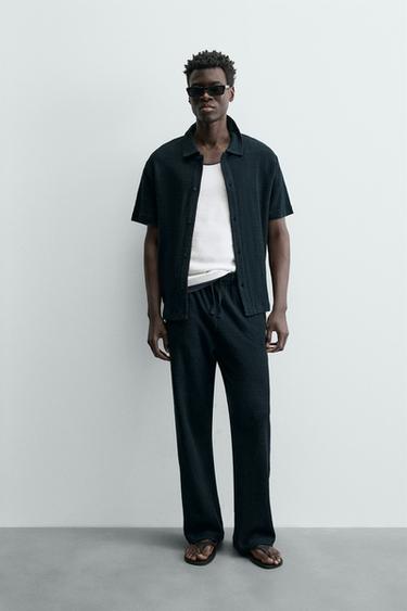 TEXTURED RELAXED FIT TROUSERS - Navy blue by Zara