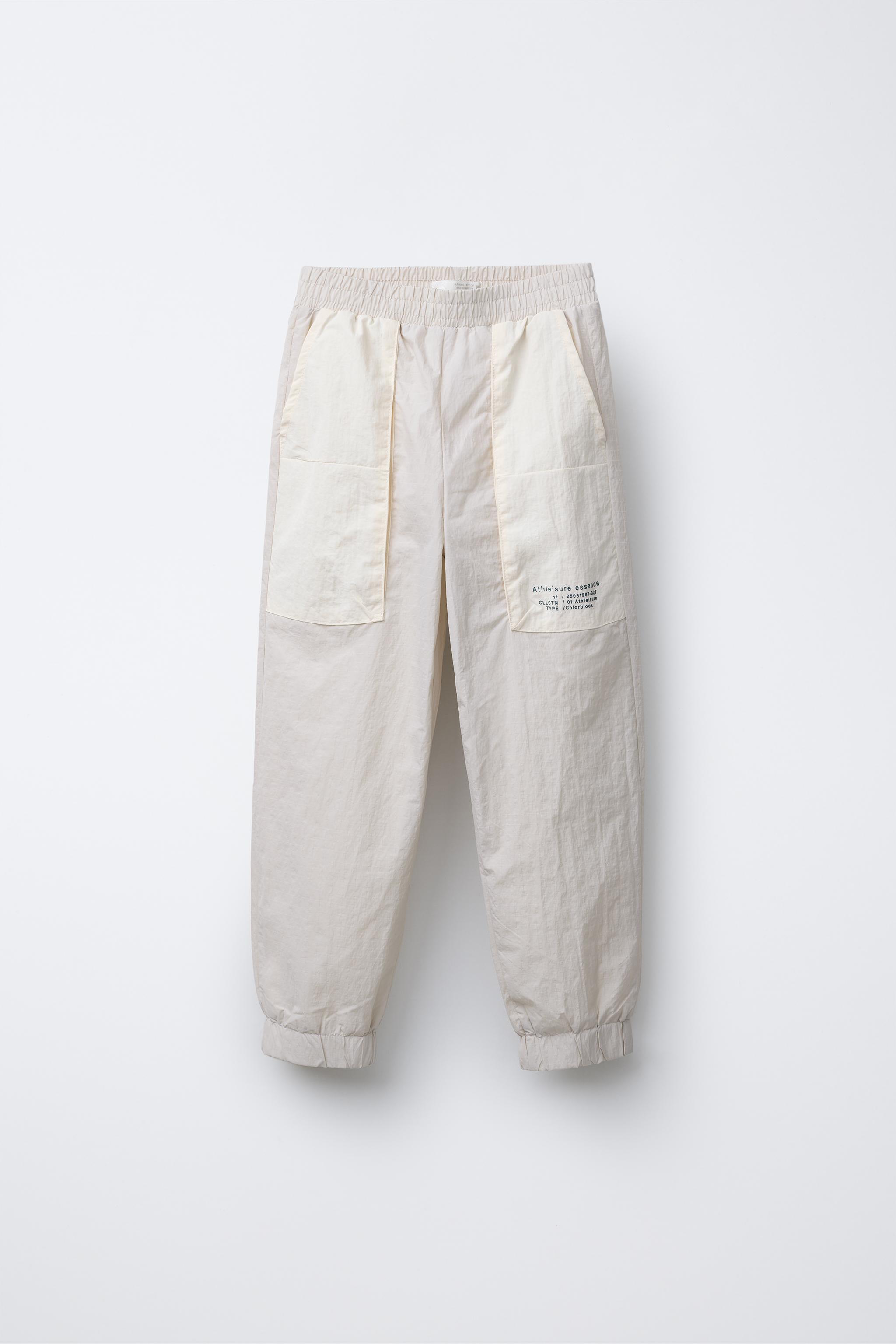 PANTALON DE JOGGING TECHNIQUE CONTRASTÉ