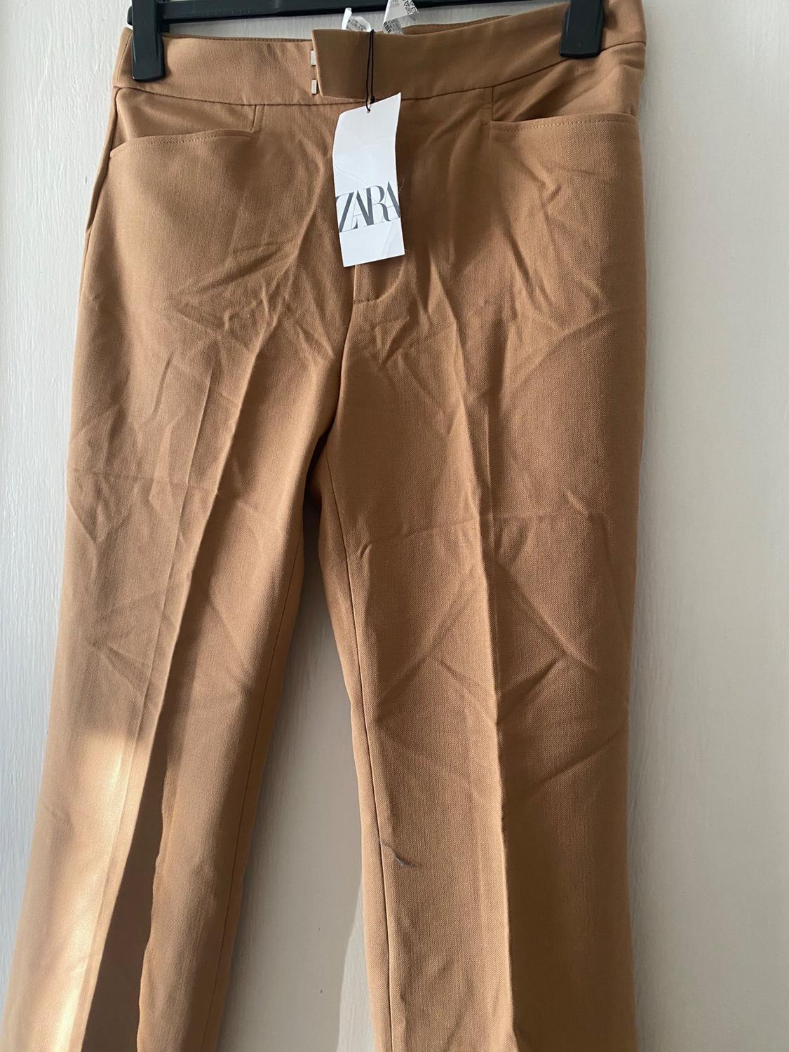 FLARED TROUSERS