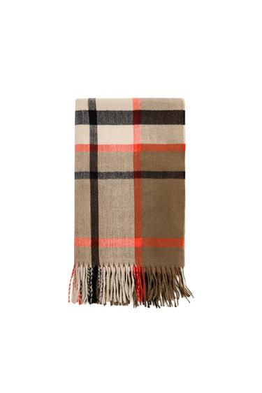 Front view of a brown and red checked scarf with tassels.