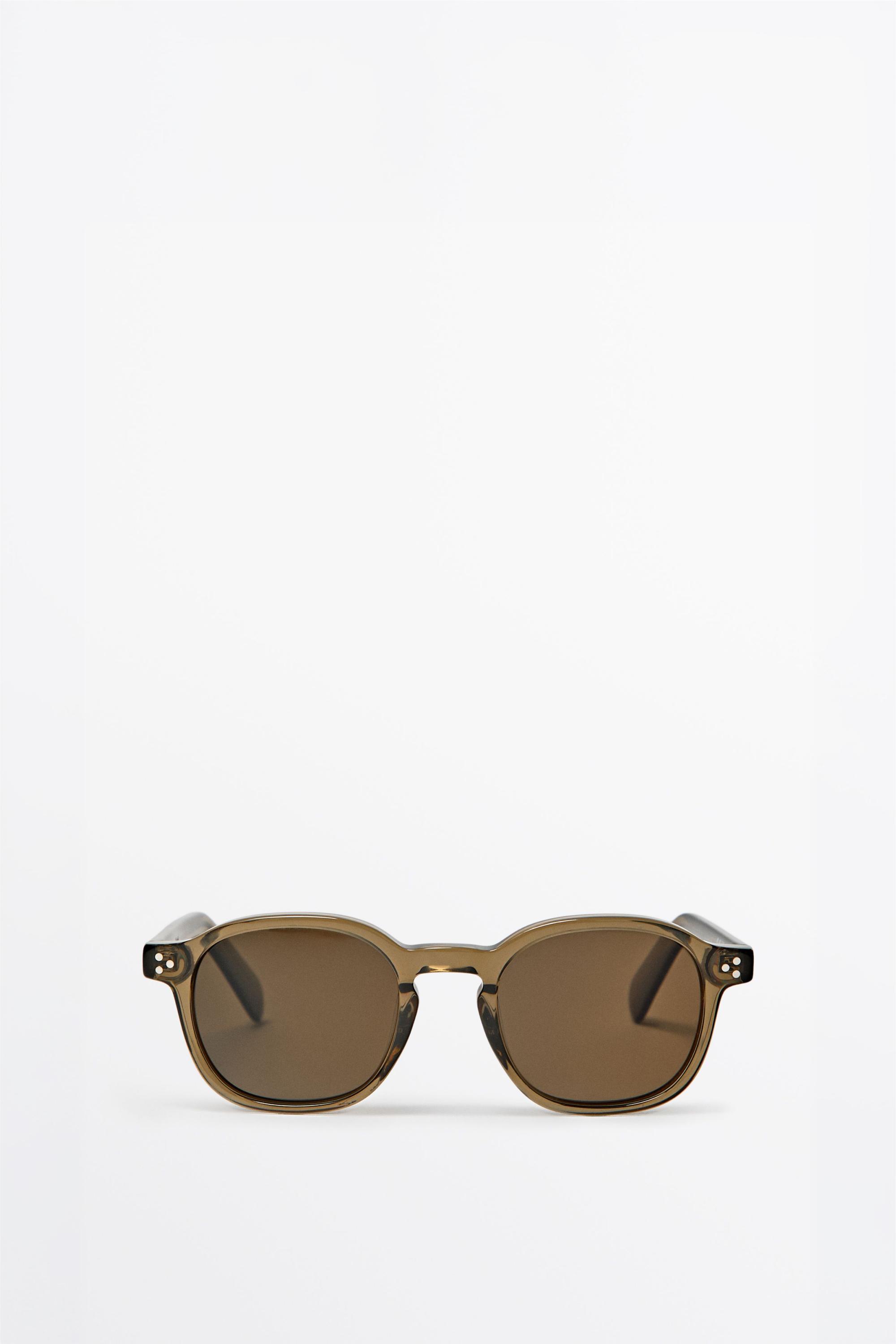 Round sunglasses — Black gold