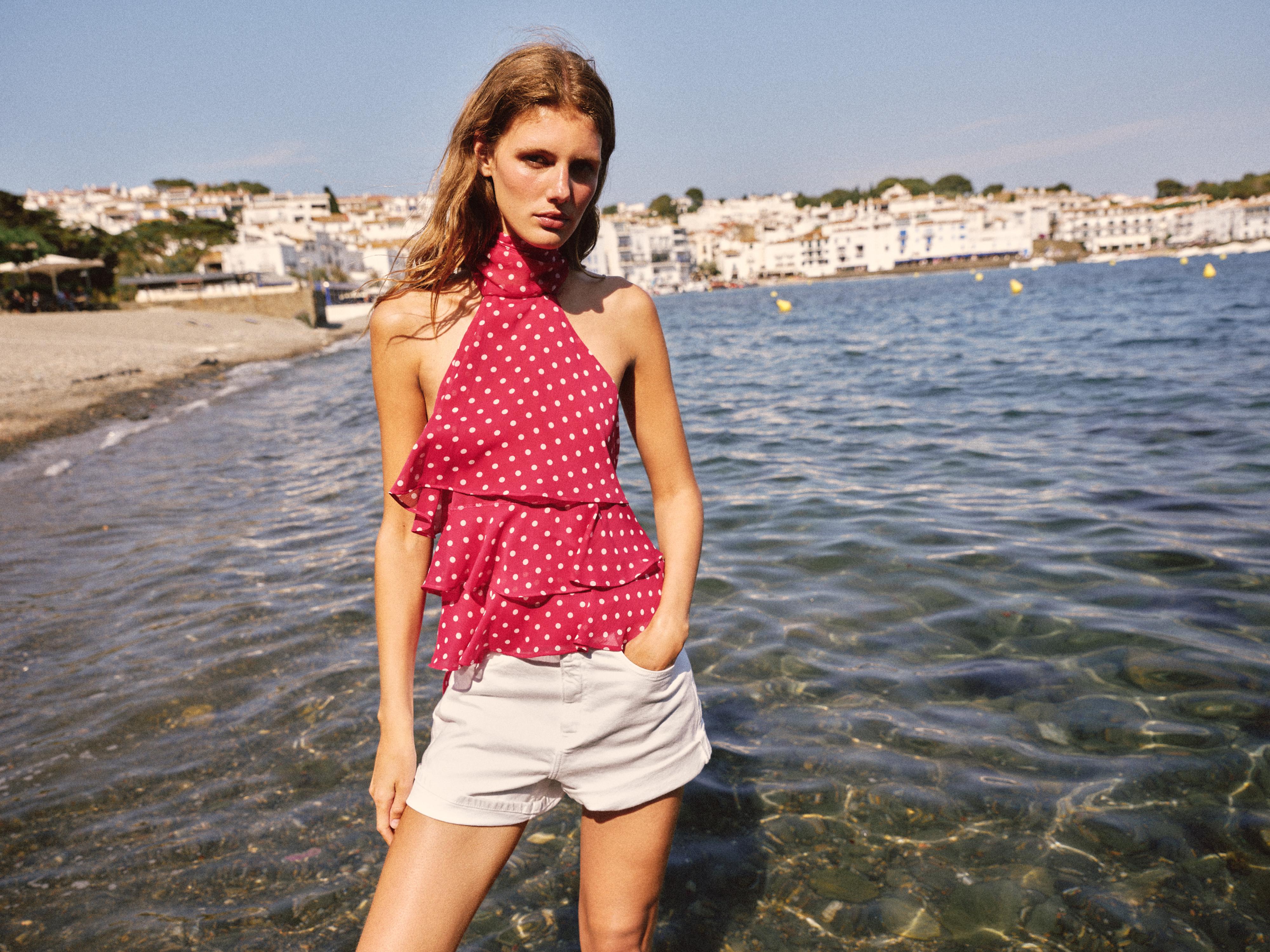 RUFFLED POLKA DOT HALTER TOP — 107