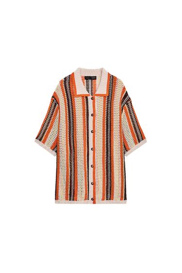 Front view of a knitted cardigan with multi-coloured stripes, polo neck, short sleeves and front button fastening.