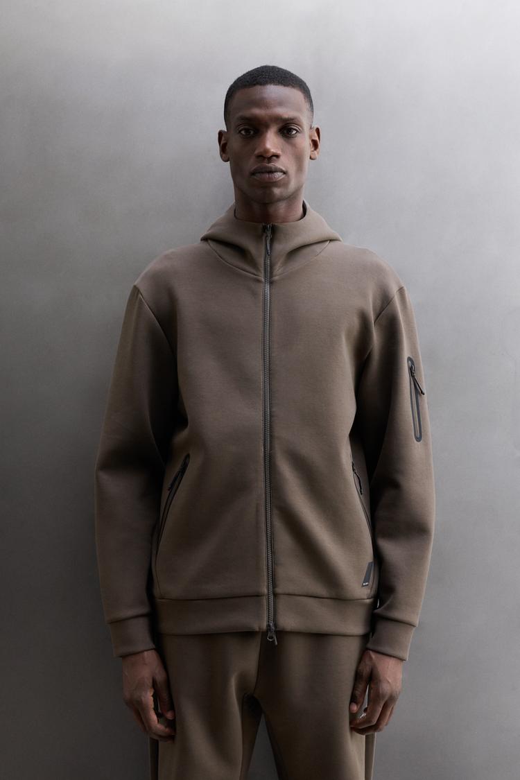 TECHNICAL ZIP HOODIE