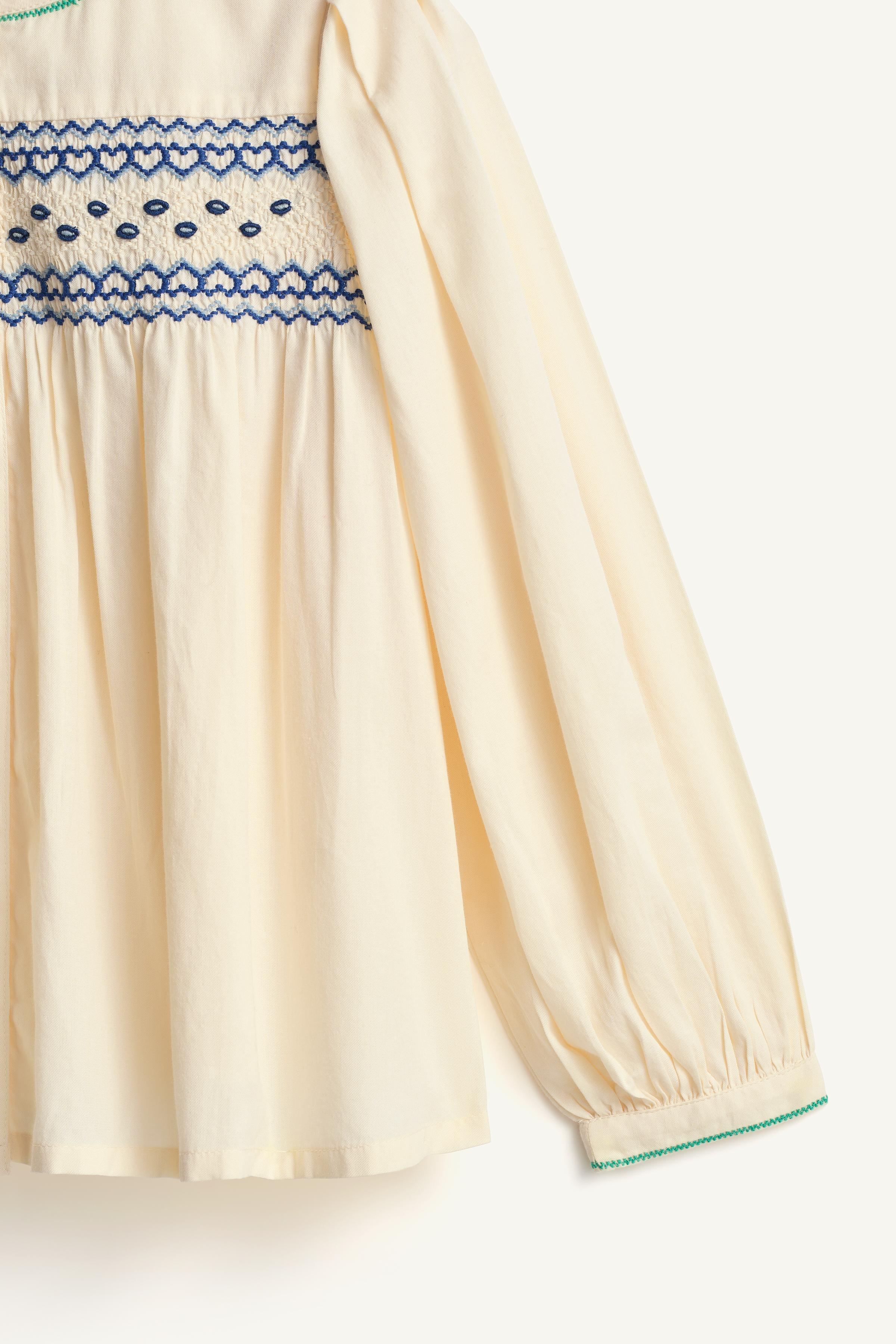 LIMITED EDITION SMOCKED BLOUSE