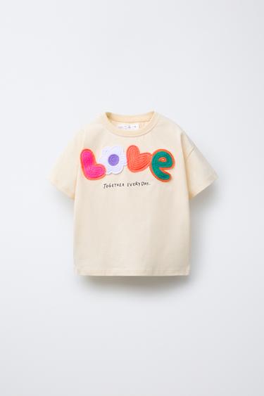 CAMISETA PARCHE RIZO - Vainilla de Zara