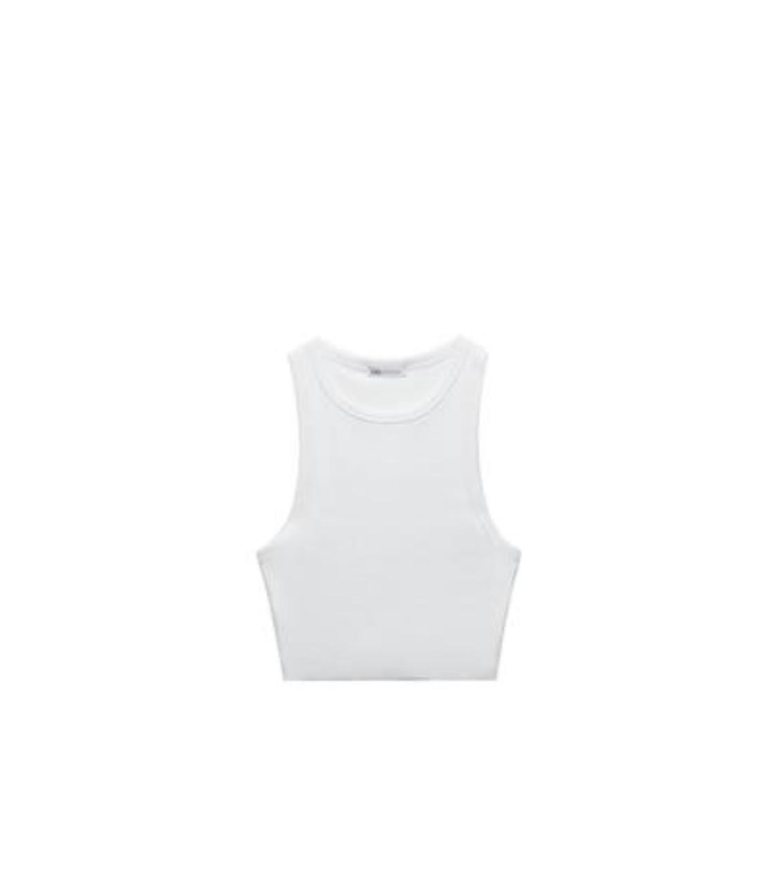 White sleeveless, crew-neck crop top on a white background.