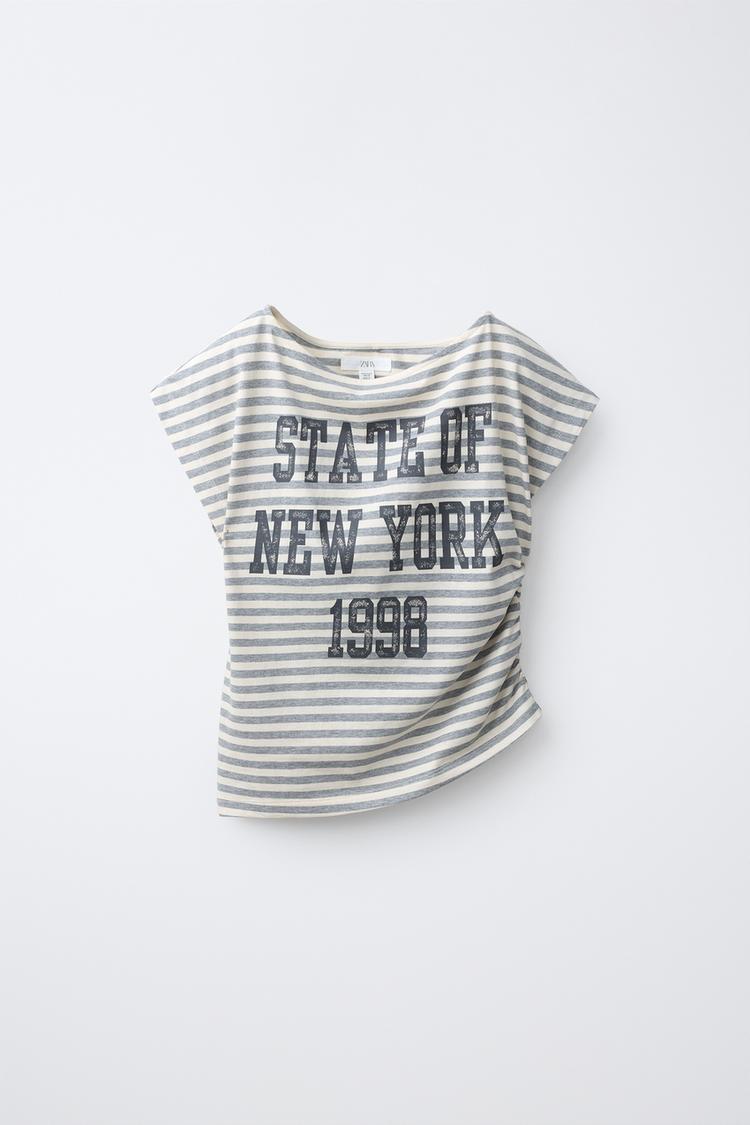 CAMISETA TEXTO FRUNCE