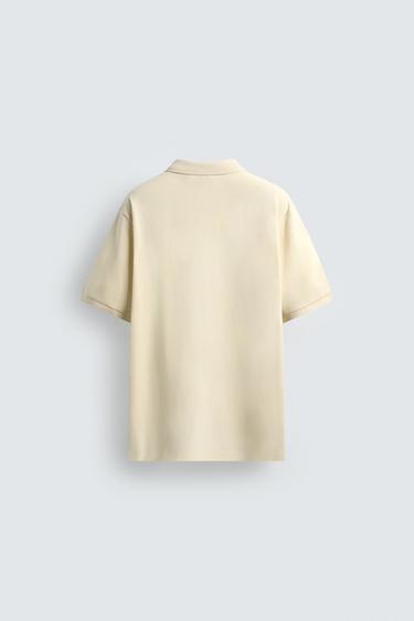 POLO DÉLAVÉ STRUCTURÉ EN PIQUÉ - Jaune pastel de Zara - Image 7