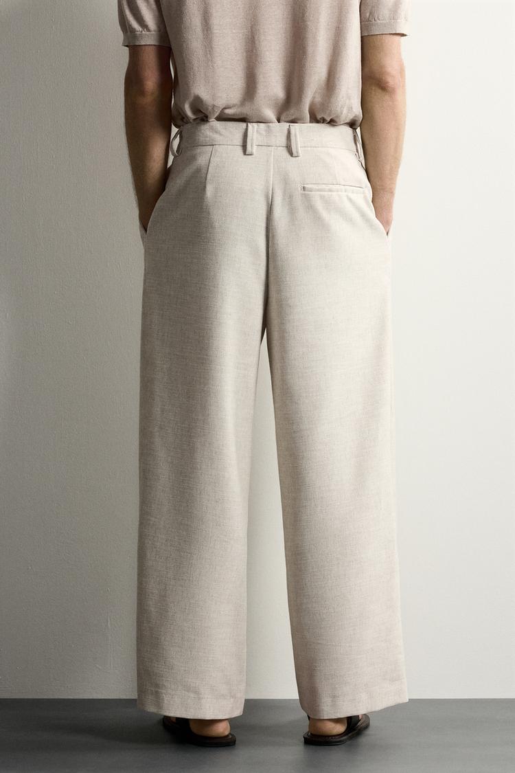 PANTALÓN CON PLIEGUES RELAXED FIT TEXTURIZADO 3