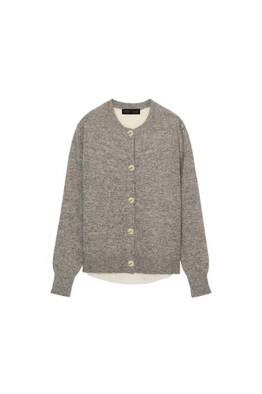 Front view of a marl grey jacket with a round neck, long sleeves, and a front button fastening.