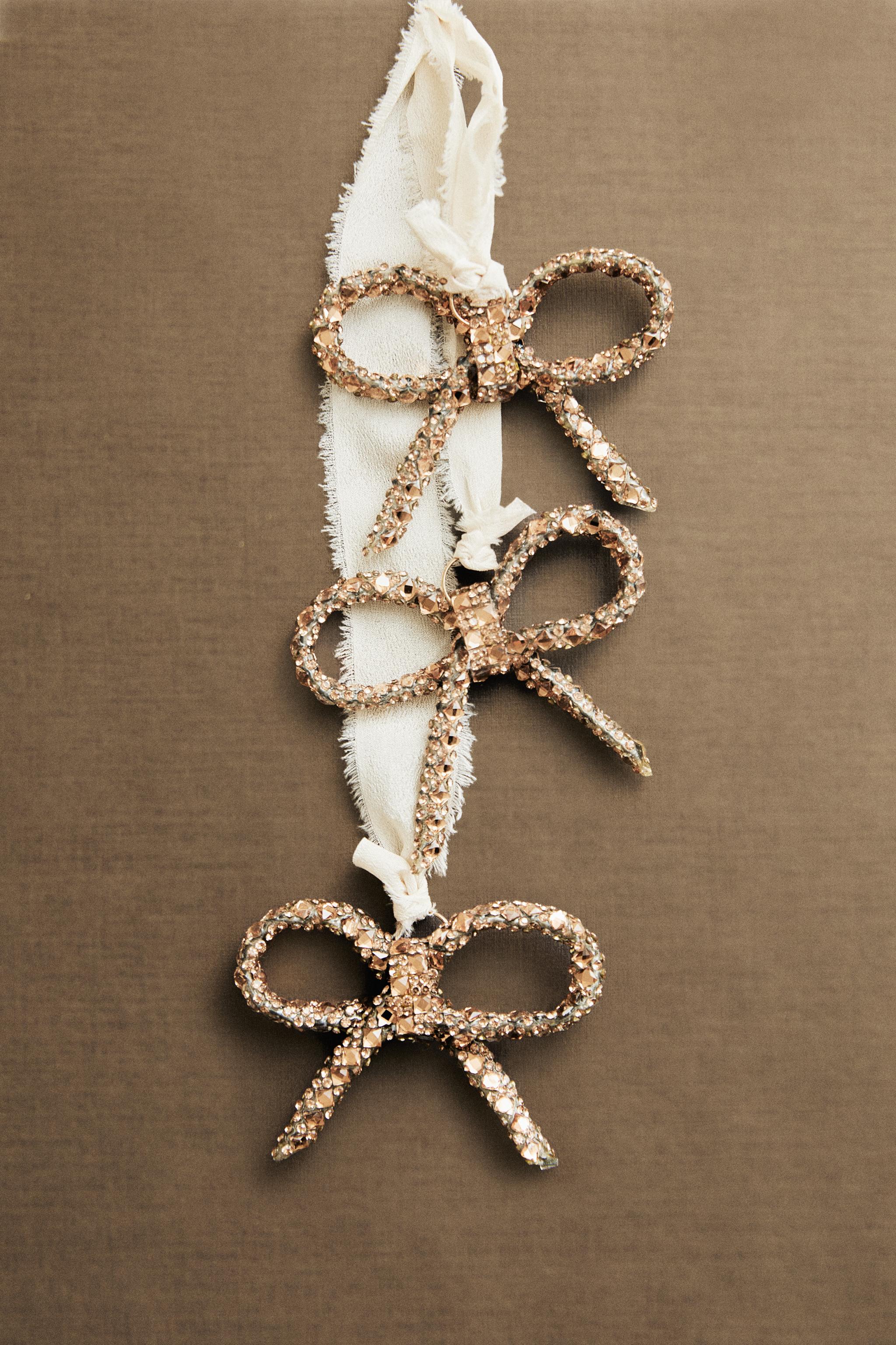 GLITTERY BOW CASCADE CHRISTMAS ORNAMENT