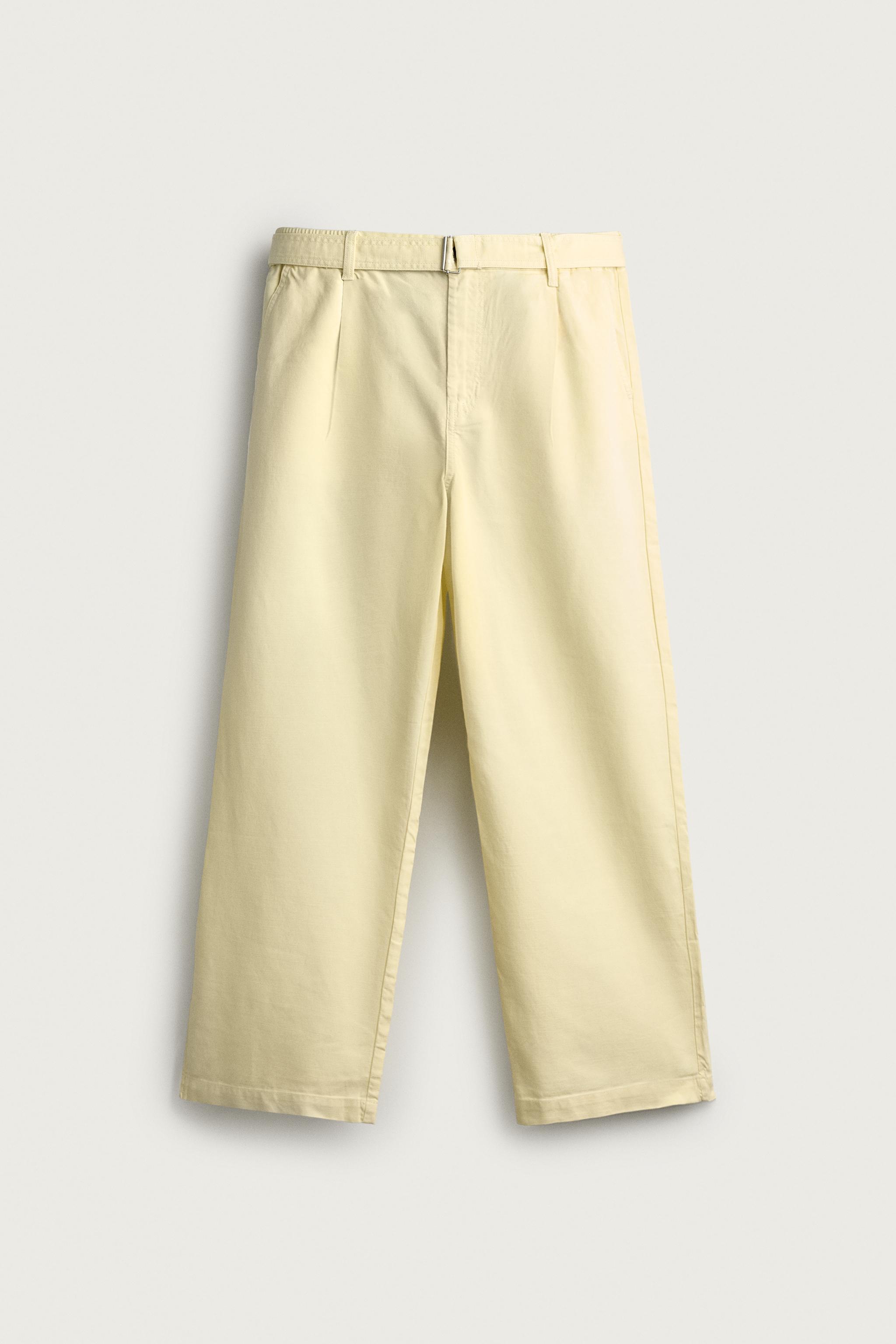 RELAXED FIT PLEATED BELTED PANTS — Light yellow