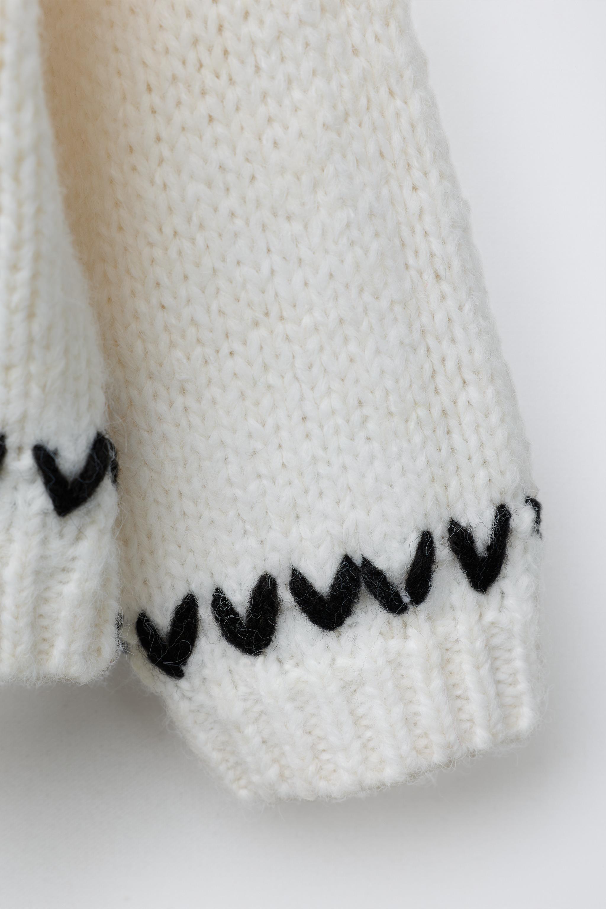 KNIT JUMPER WITH PIPING