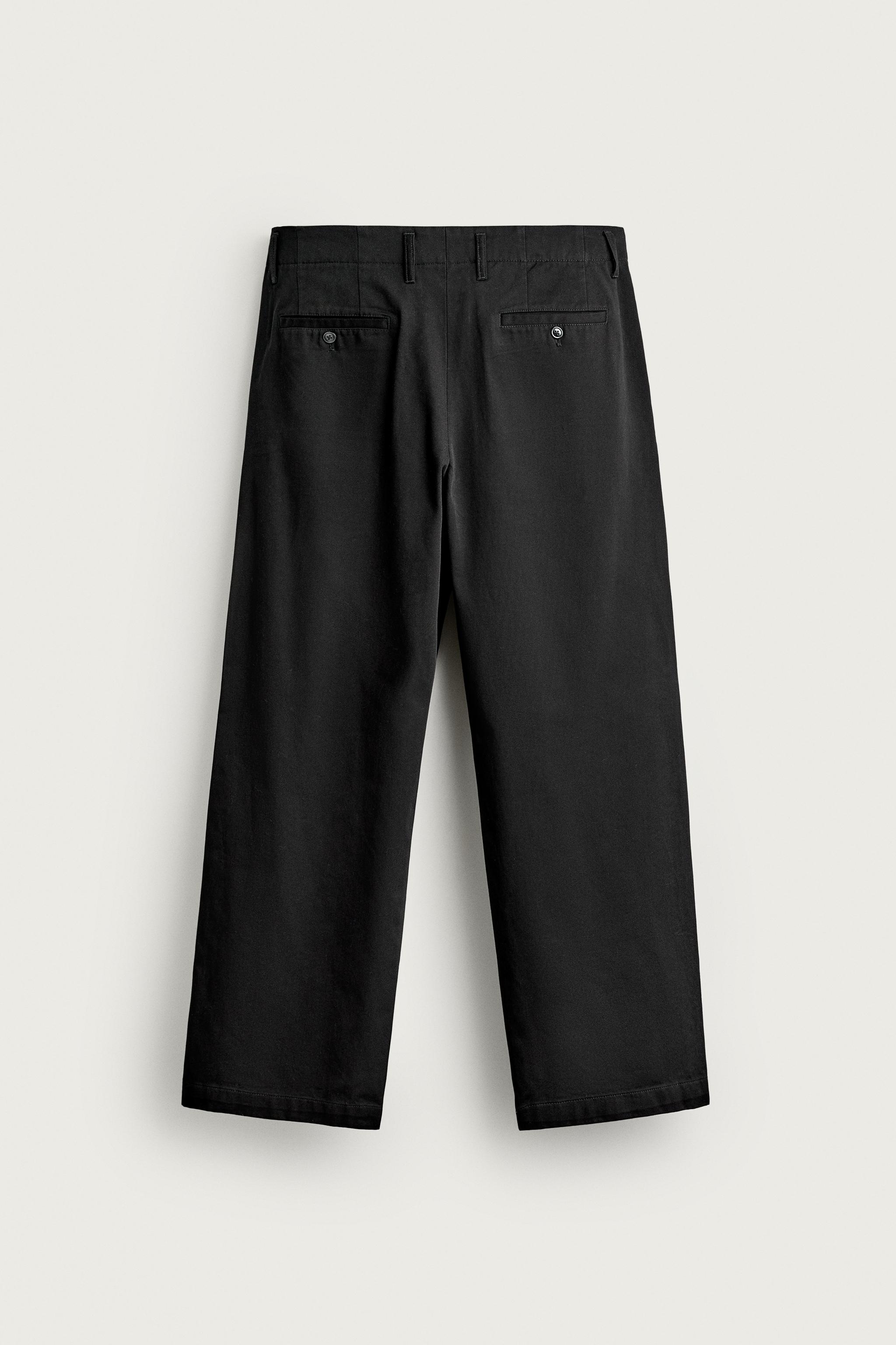 RELAXED FIT PLEATED CHINO PANTS — Black
