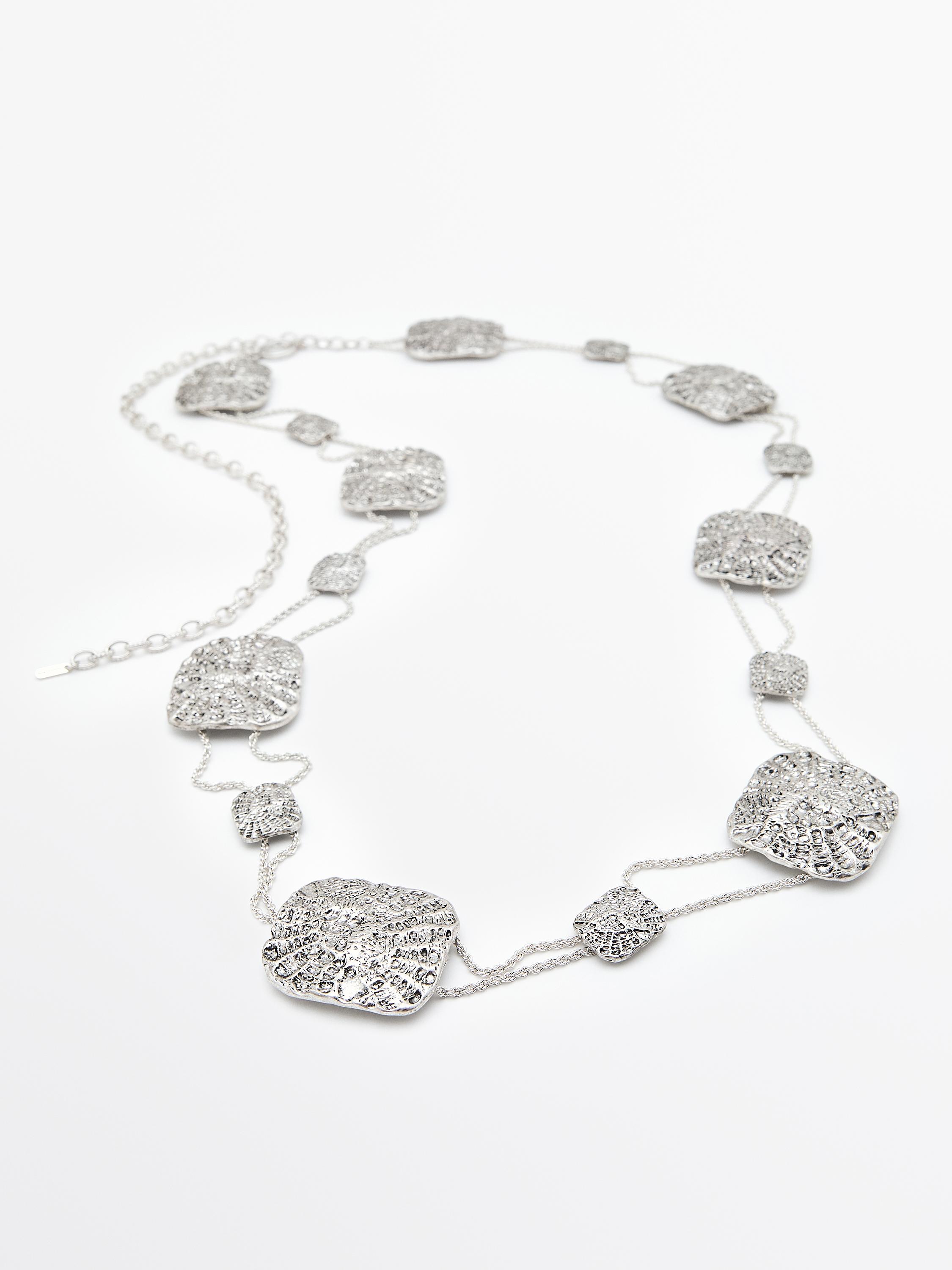 Textured chain and medallion belt