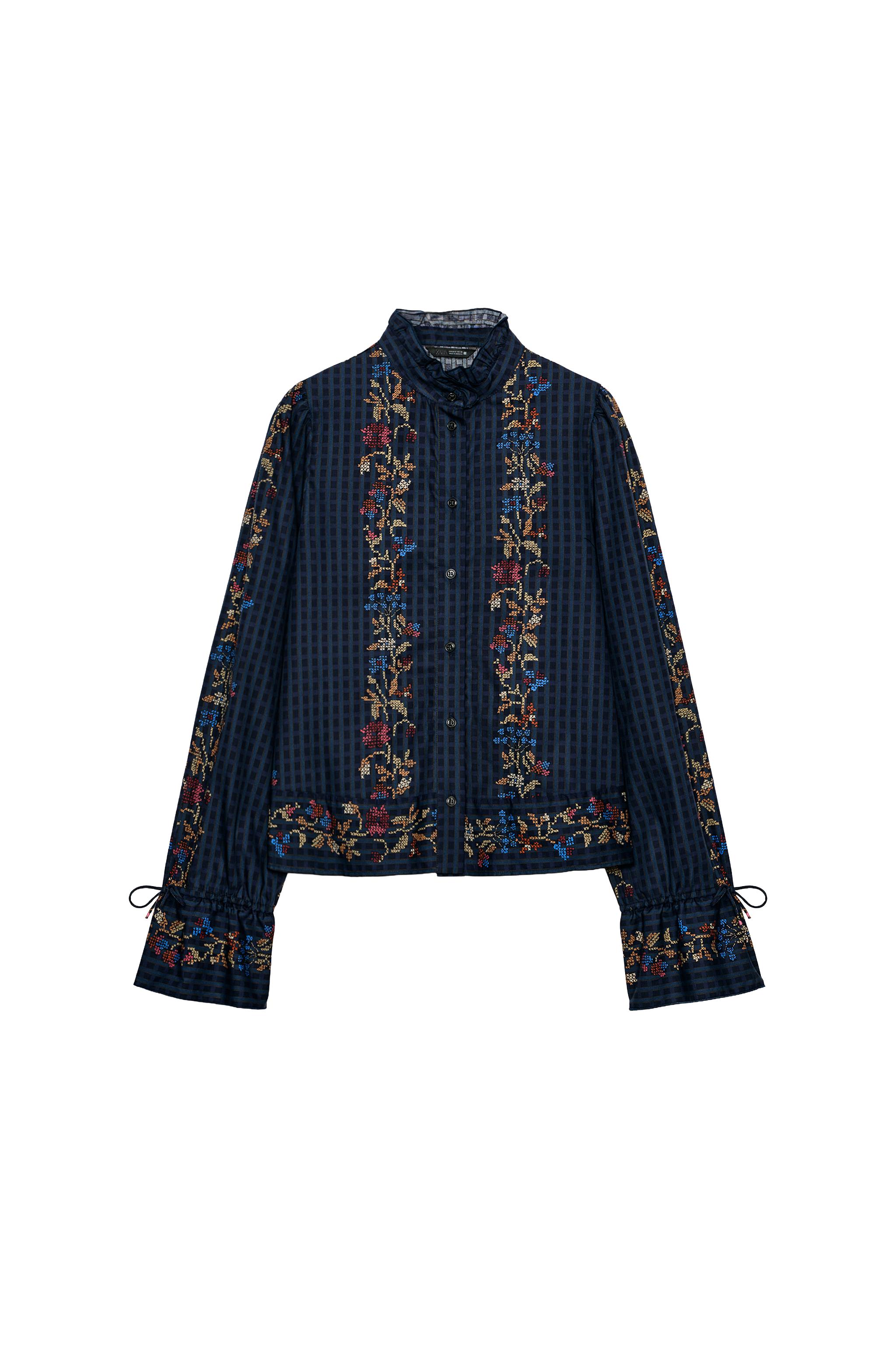 BLUSA ESTAMPADA VOLANTE