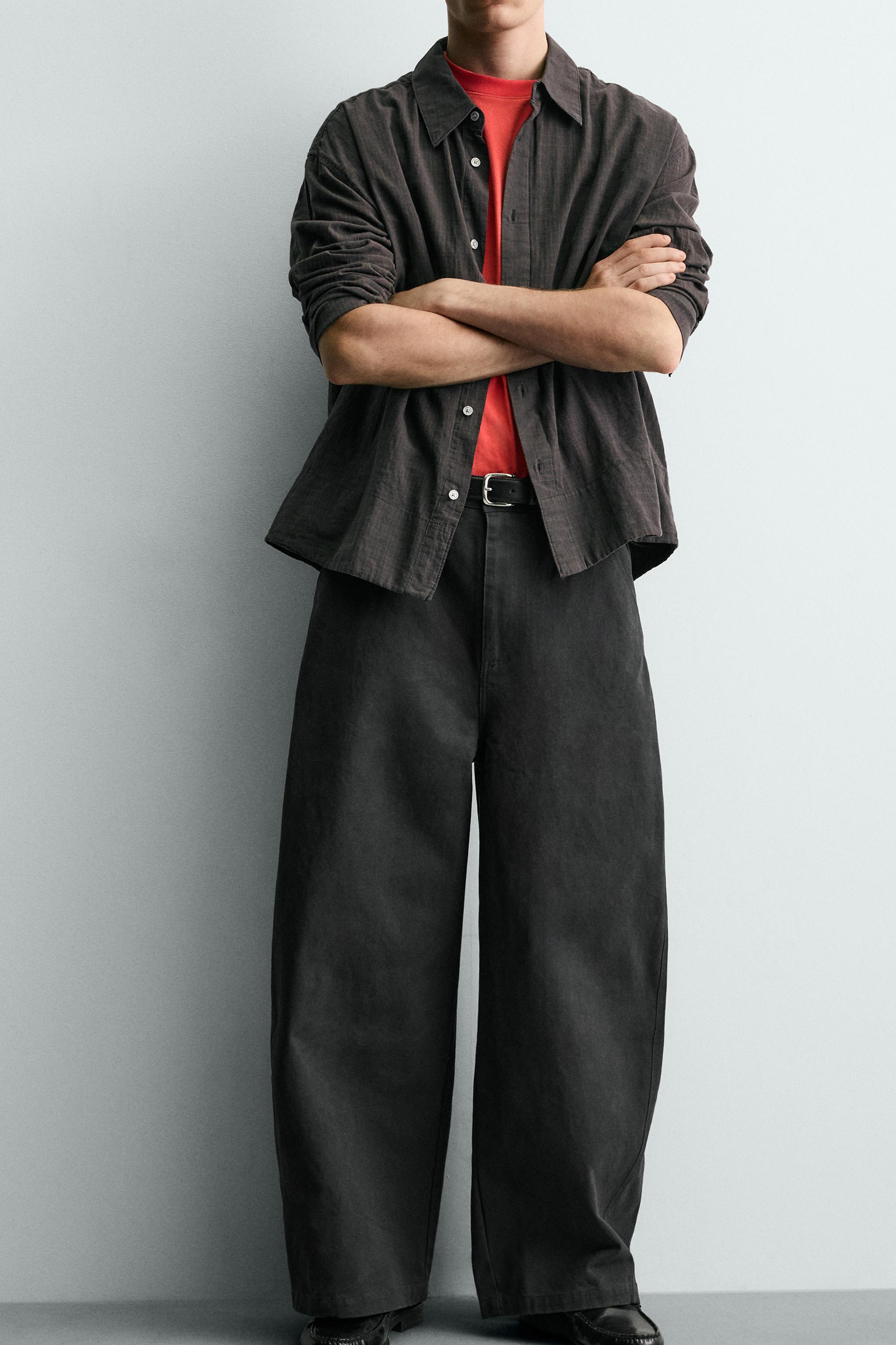 RELAXED FIT PANTS WITH TWISTED SEAM