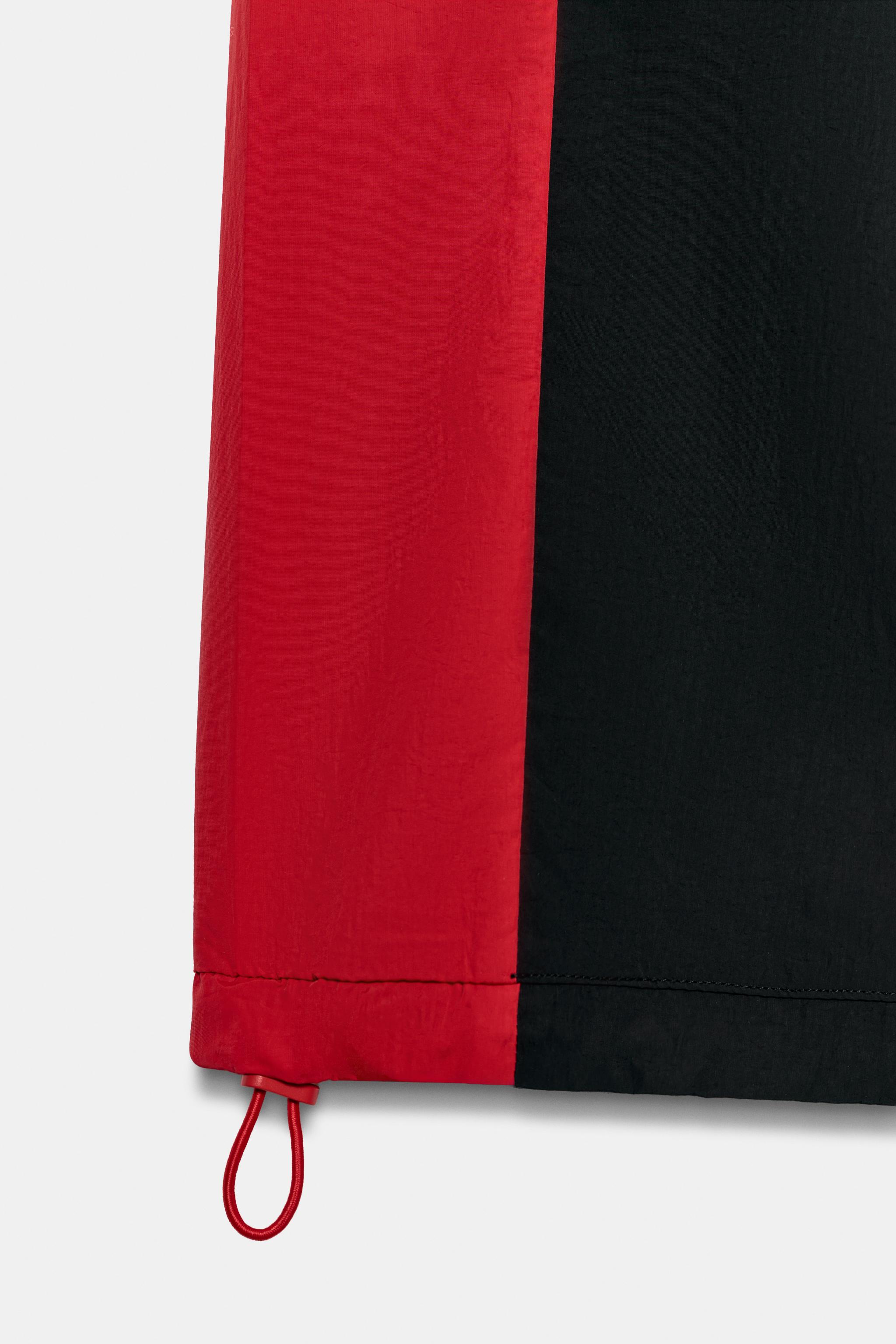 PANTALON TECHNIQUE VOLUME BANDE LATÉRALE