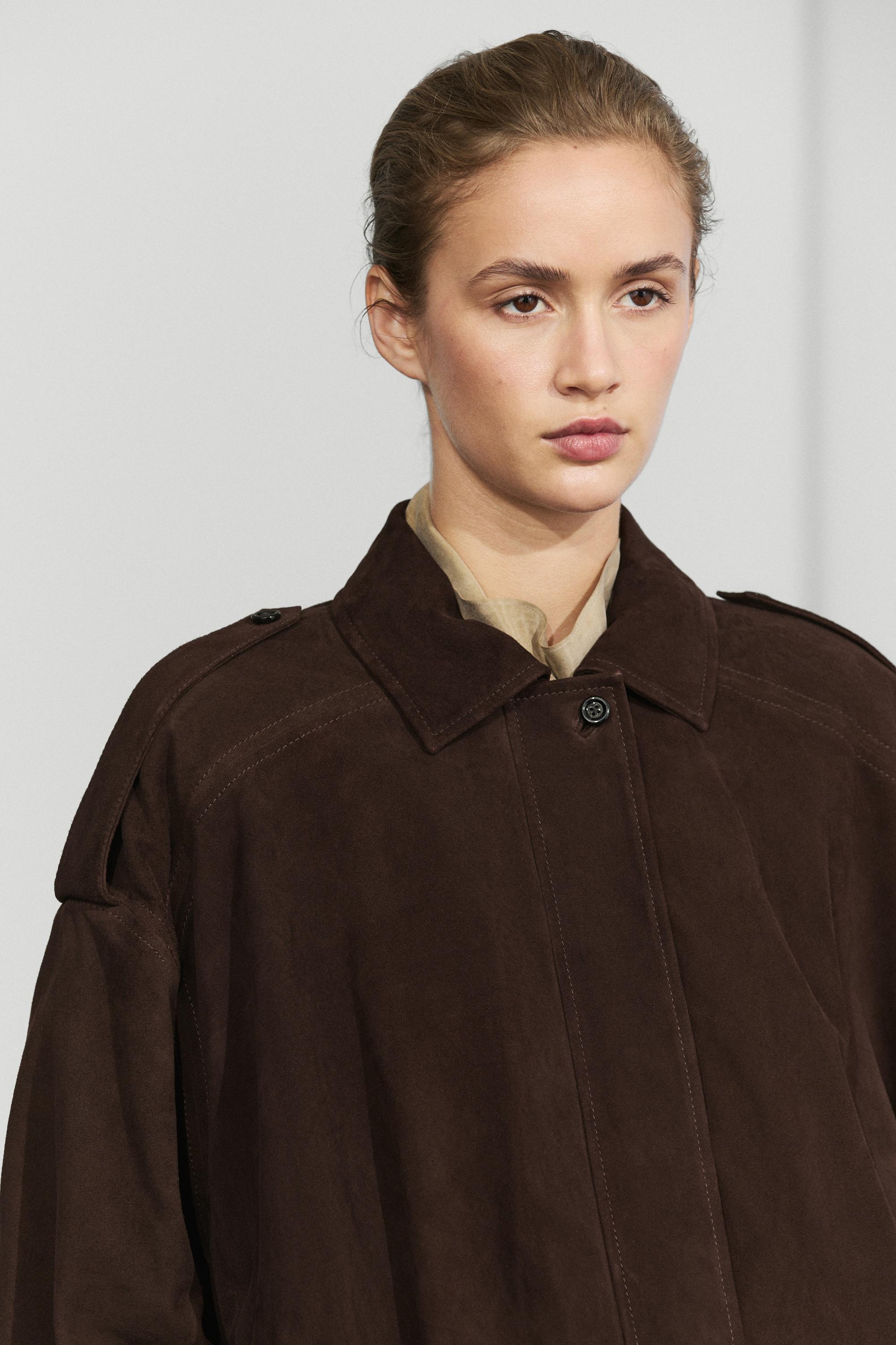 Blouson bomber avec détail de plis en cuir et daim