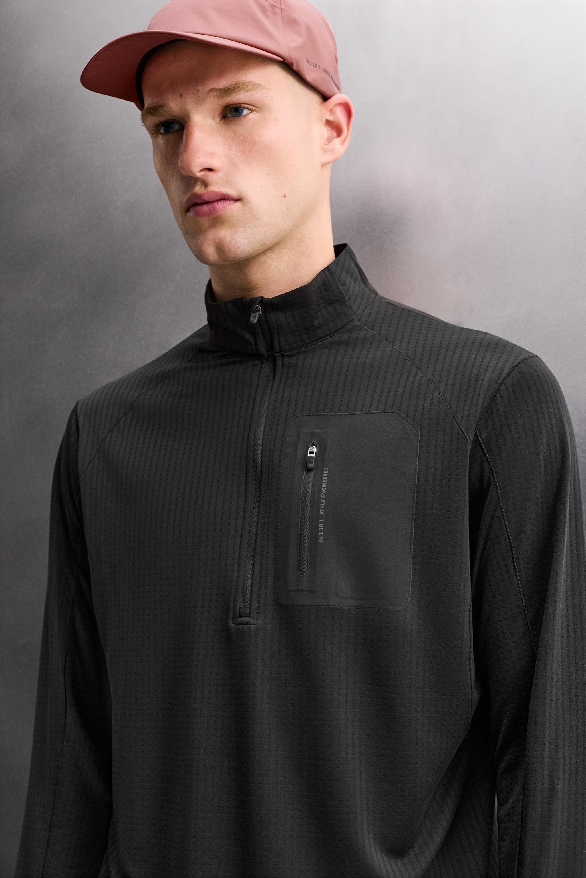 COMBINATION POCKET QUARTER-ZIP SWEATSHIRT