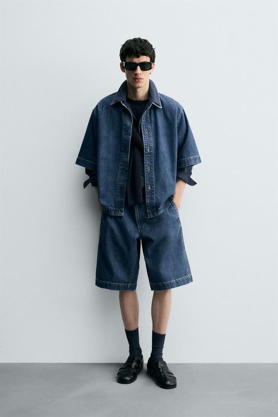 PLEATED RELAXED FIT DENIM SHORTS