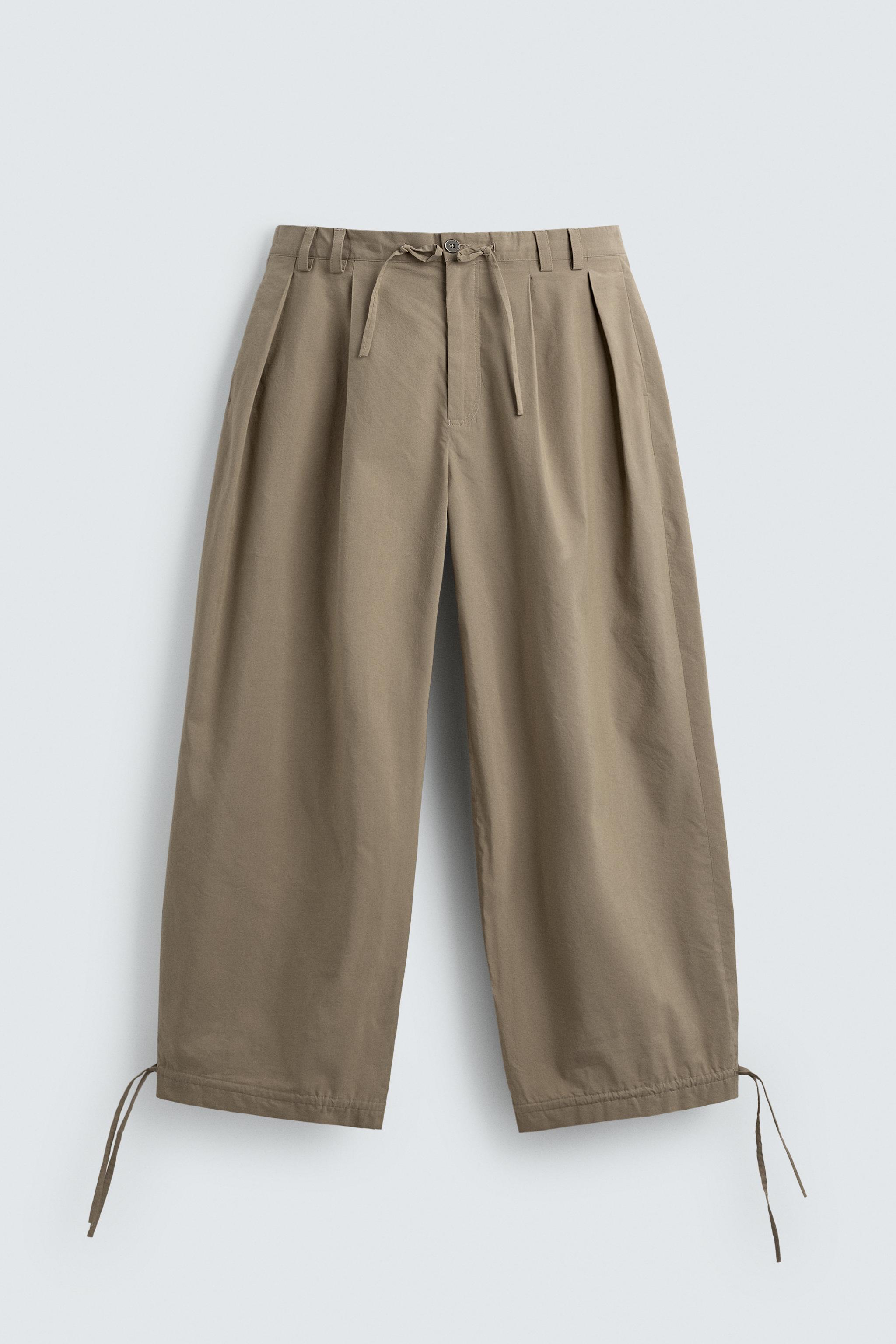 BALLOON FIT PLEATED PANTS
