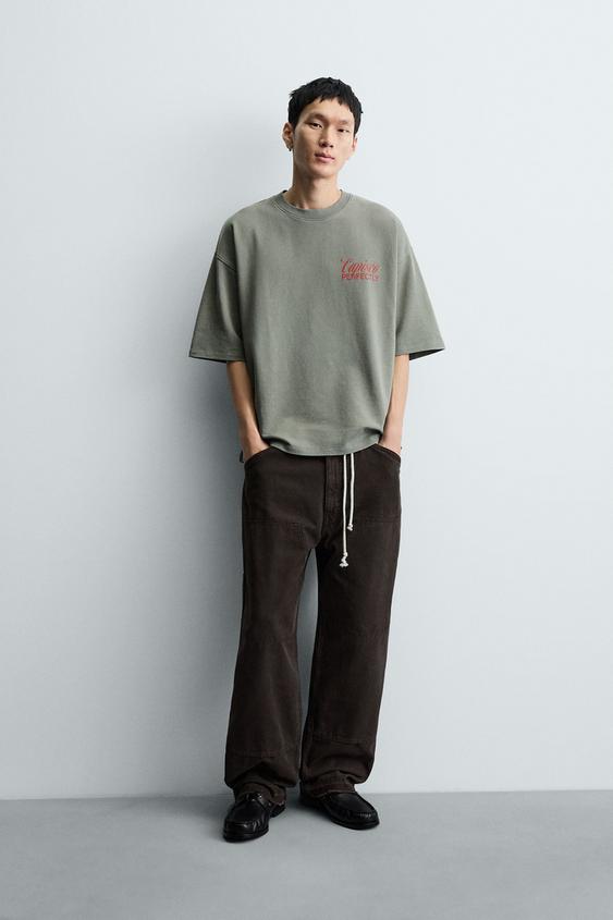 WASHED PRINTED TEXT SWEATSHIRT