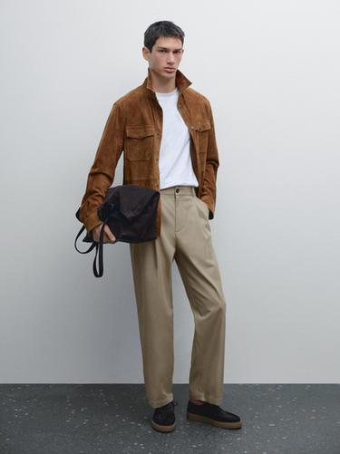 Pantalon relaxed fit à pinces - Sable de Zara