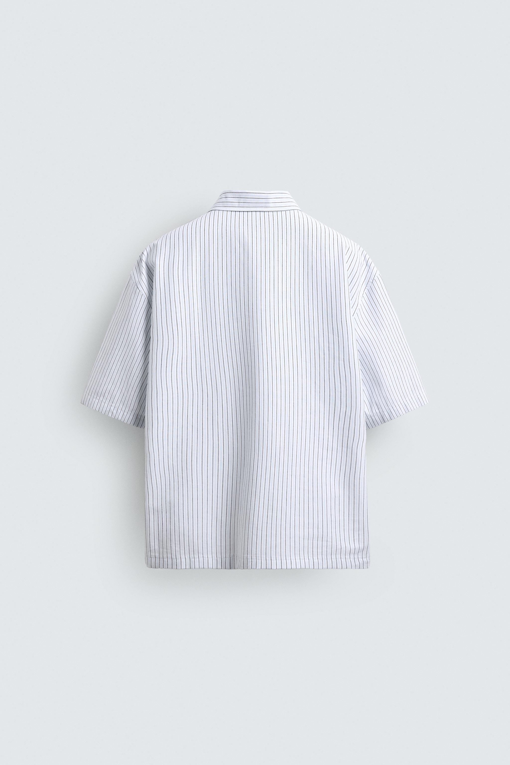 PRINTED TEXT BOXY FIT POLO SHIRT