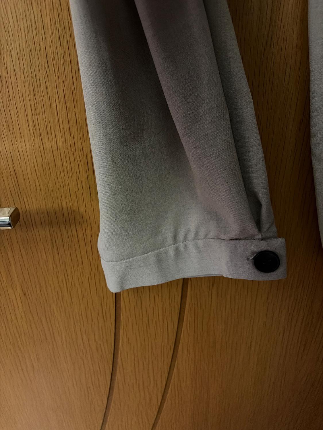 CARROT-FIT TROUSERS WITH CUFFED HEMS - Image 3
