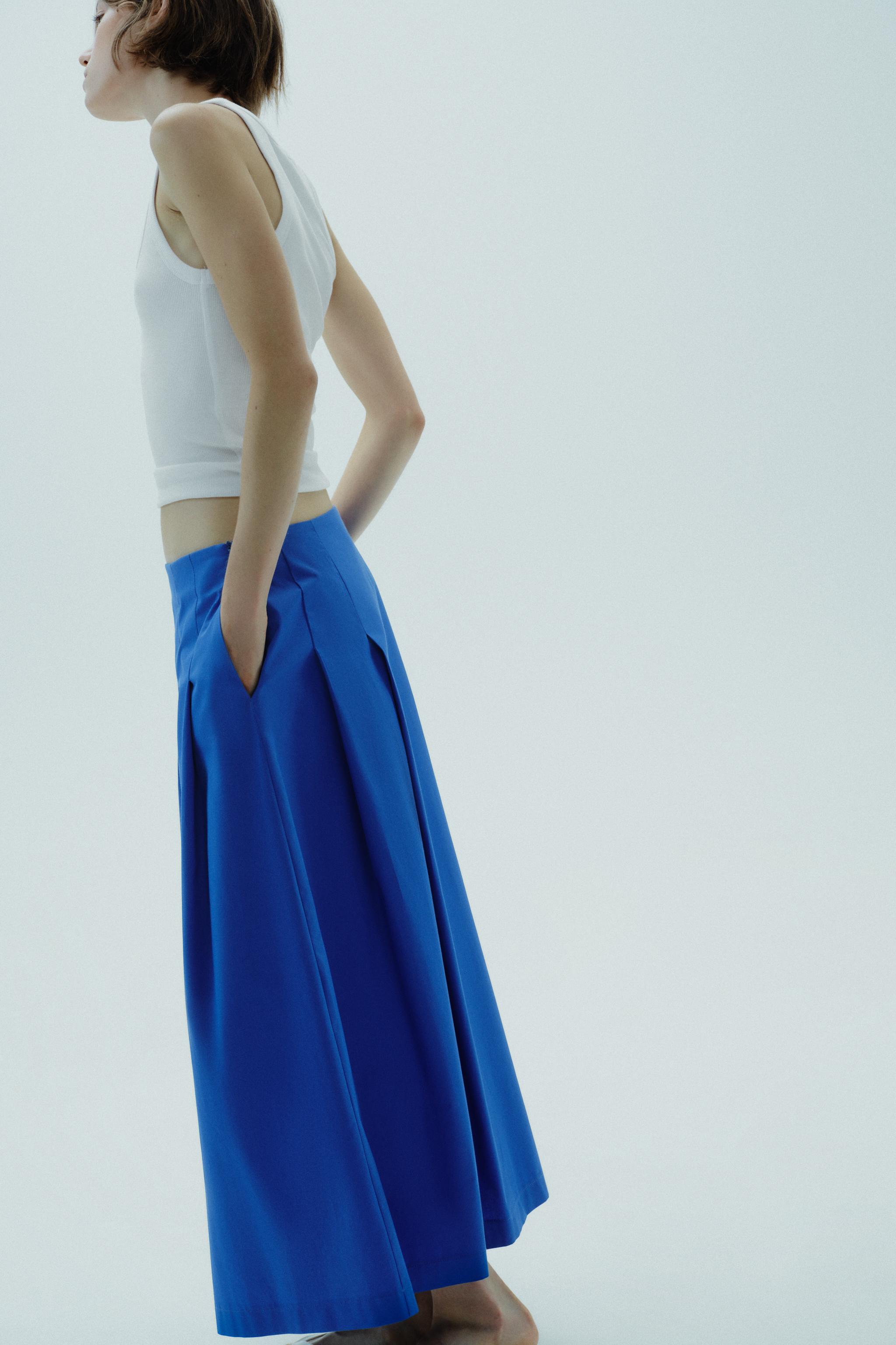 PLEATED MIDI SKIRT