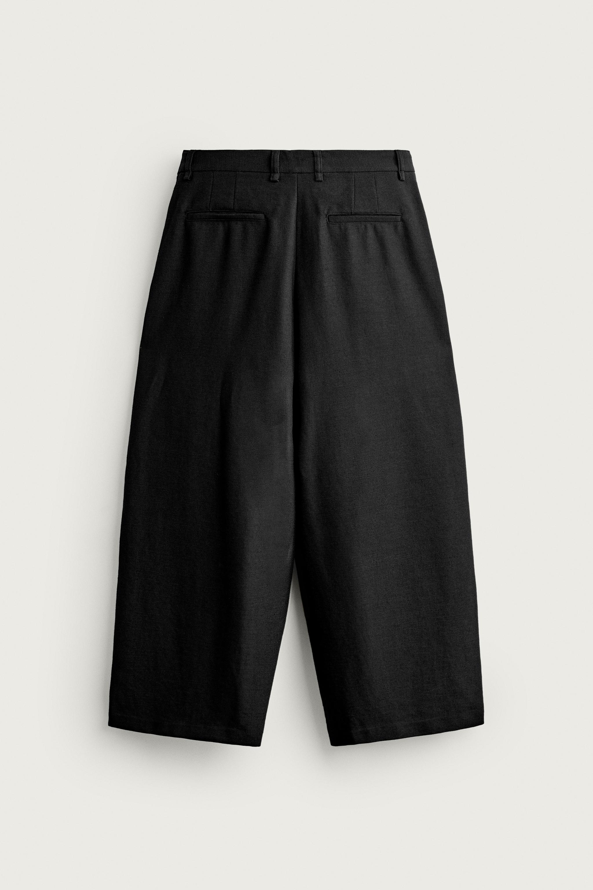 RELAXED WIDE-FIT PLEATED PANTS — Black