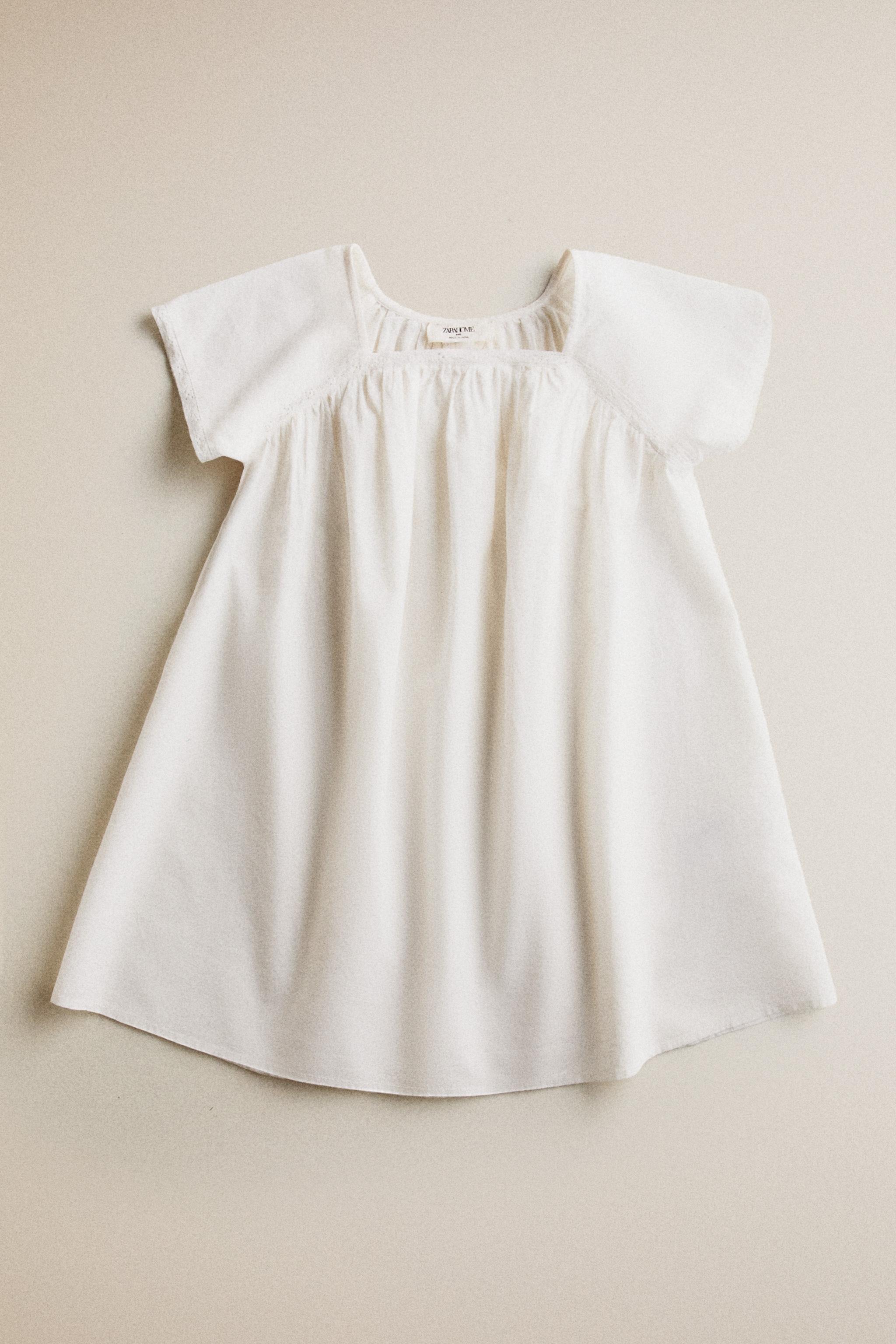 CHILDREN'S DRESS WITH LACE TRIM — Cream