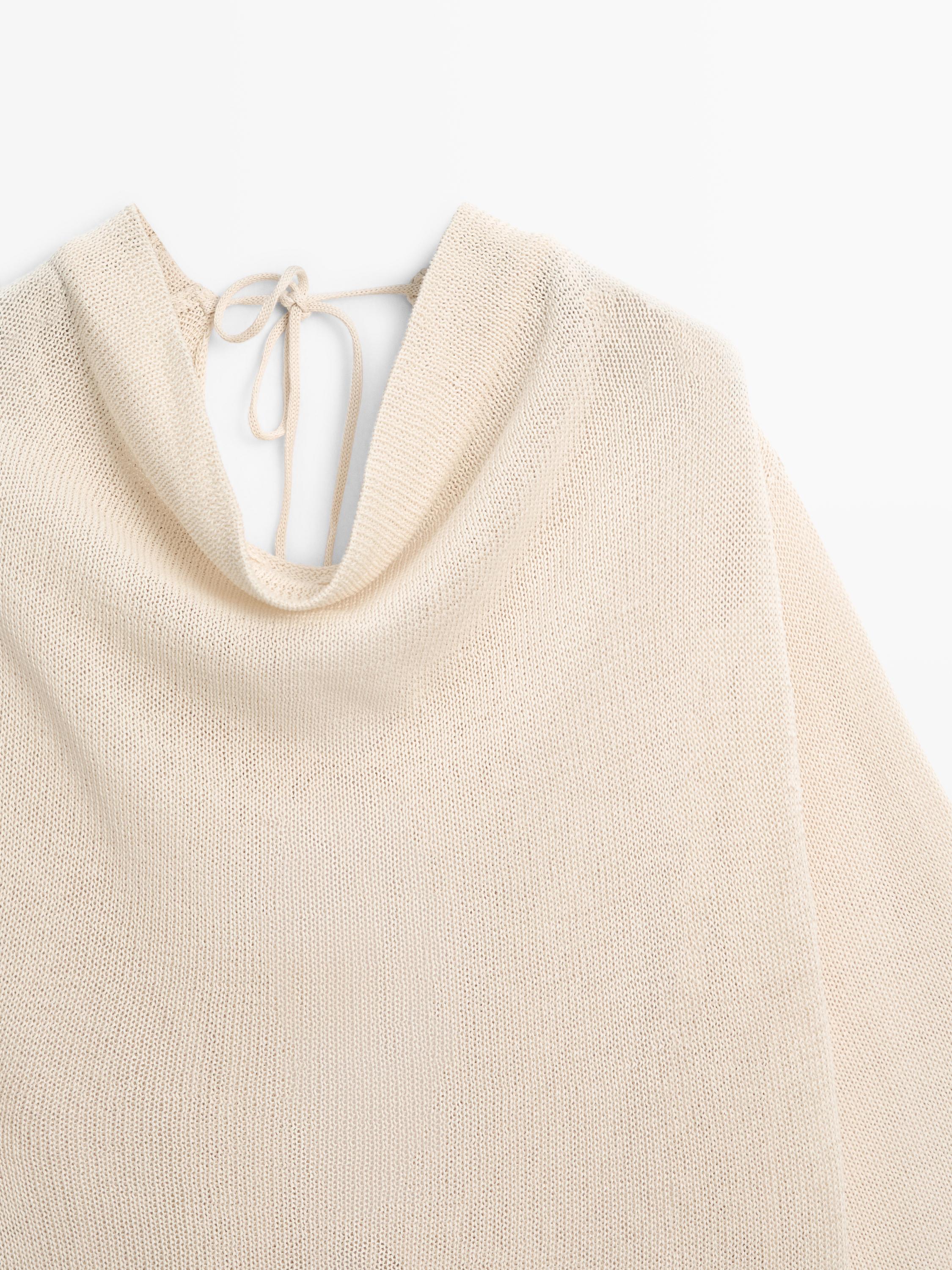 100% cotton knit sweater with back ties