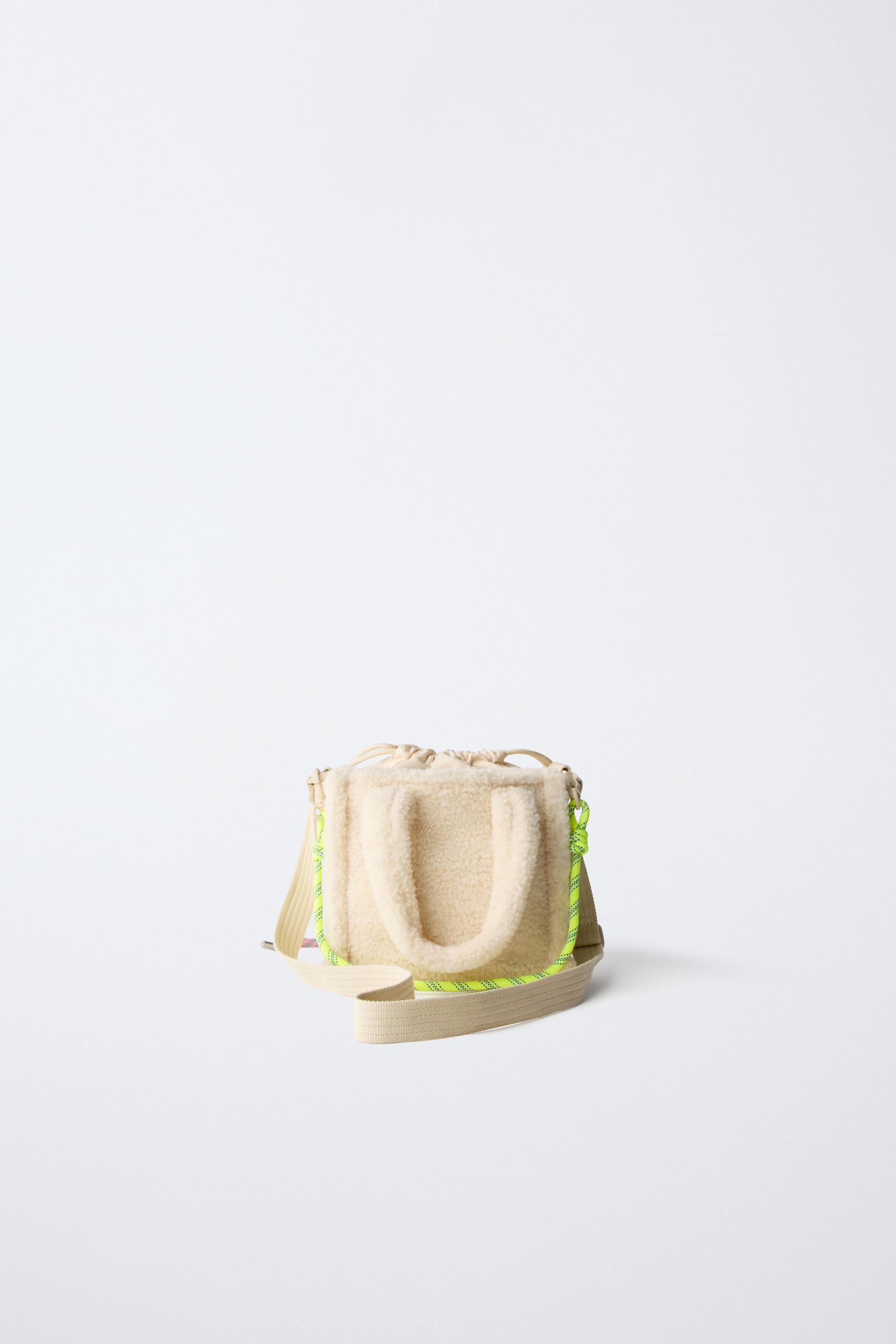 SAC BANDOULIÈRE EN PEAU DE MOUTON CHARM