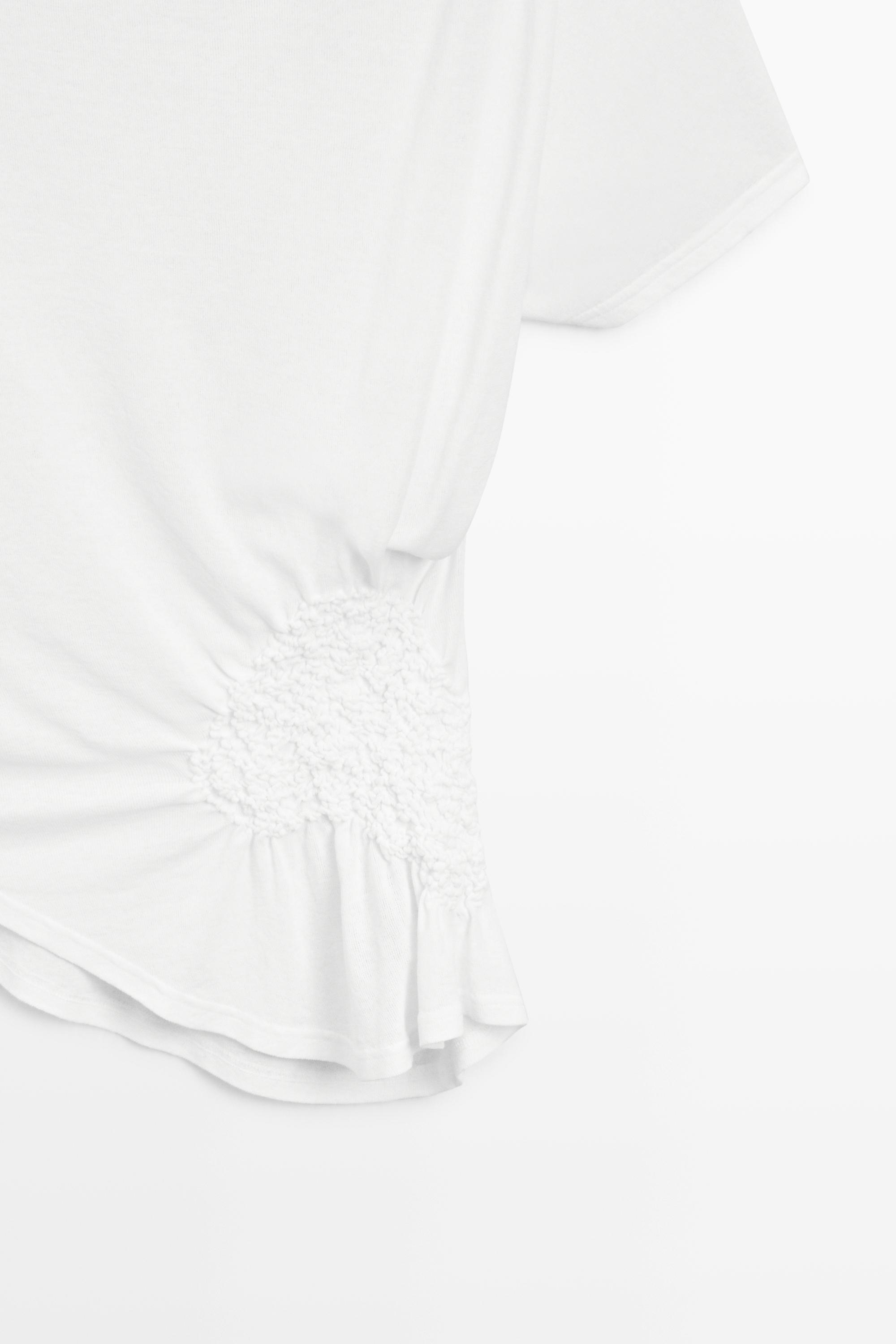 Asymmetric top with embroidered detail