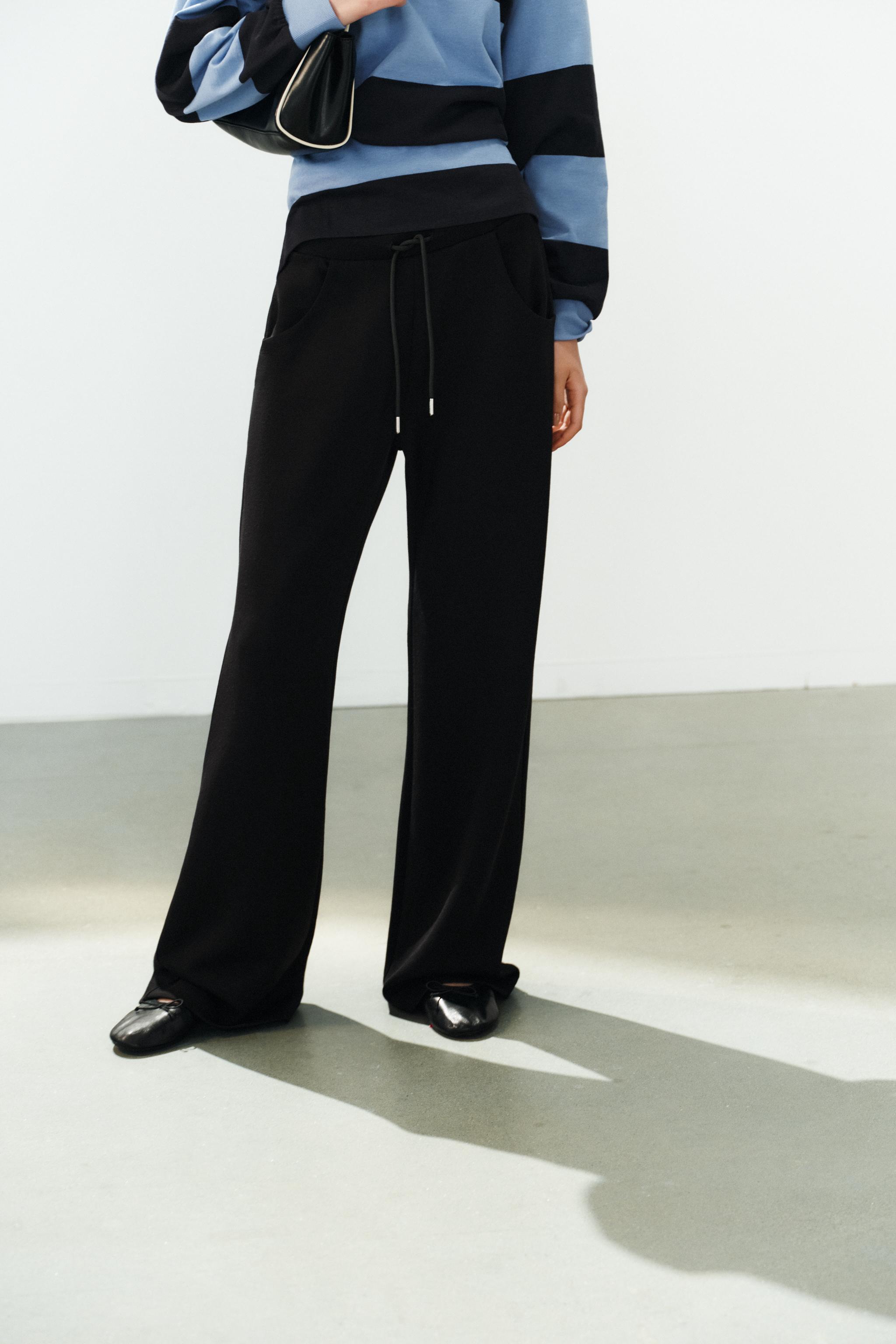 INTERLOCK FLARED PANTS