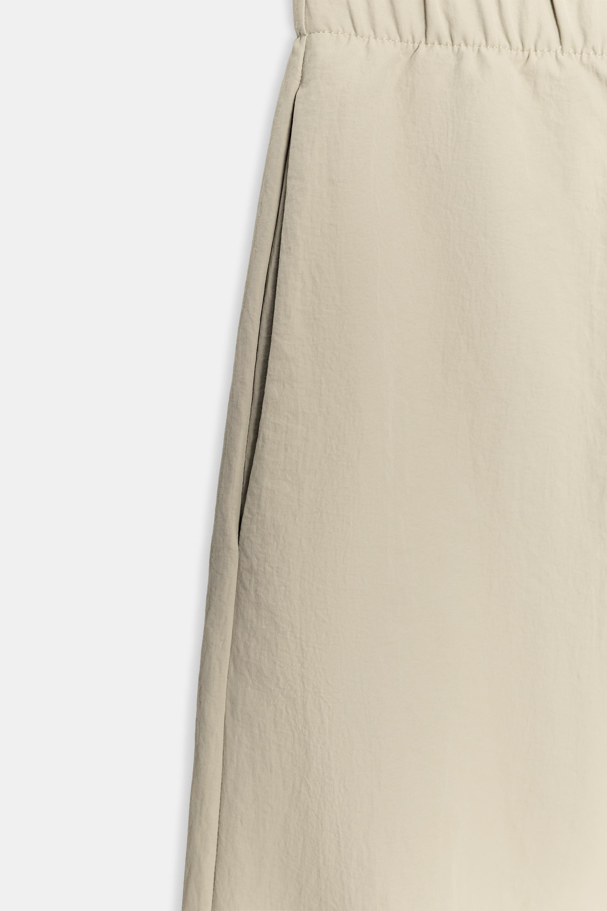 PANTALON EN TISSU TECHNIQUE ÉLASTIQUE