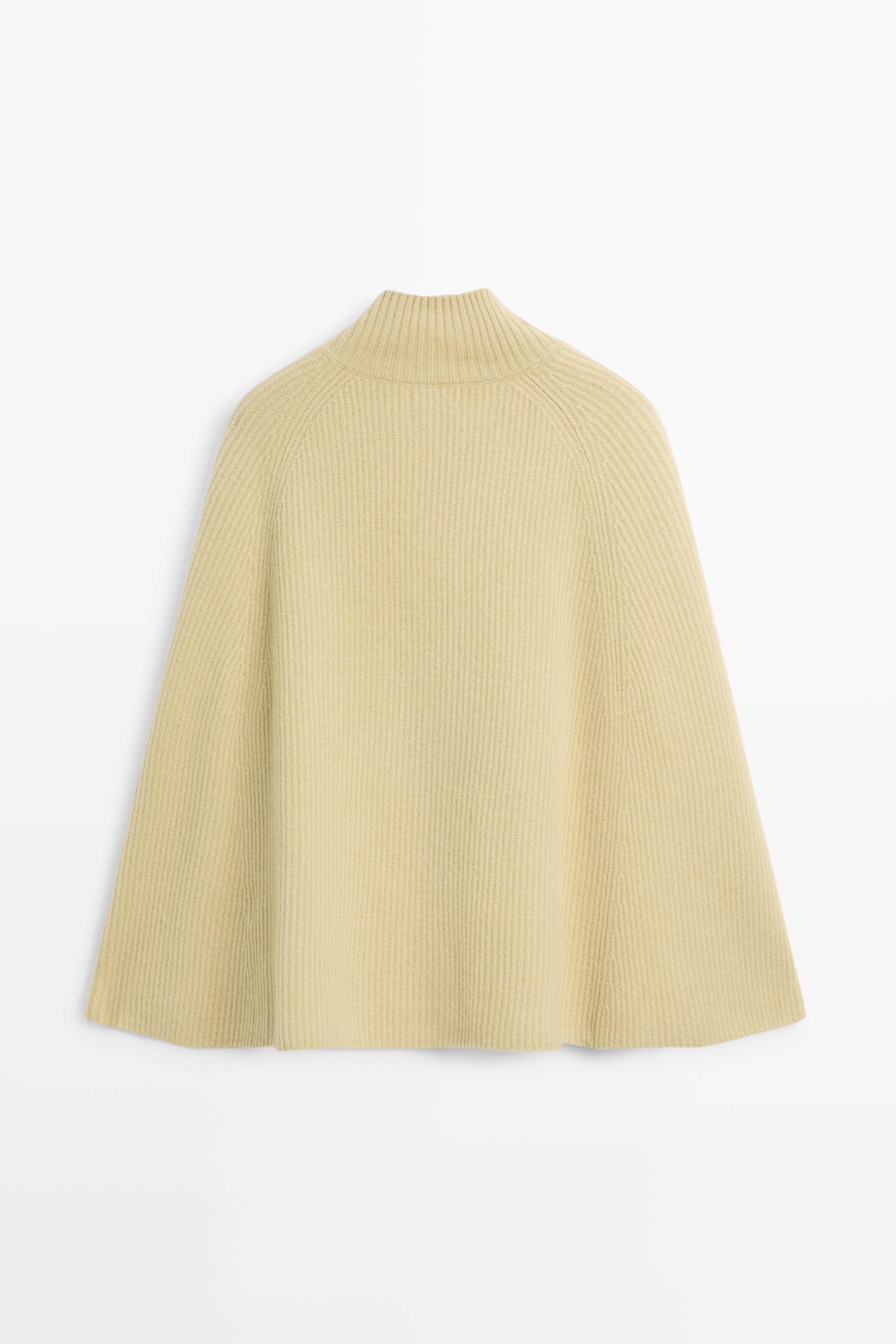 100% wool knit cape with button detail