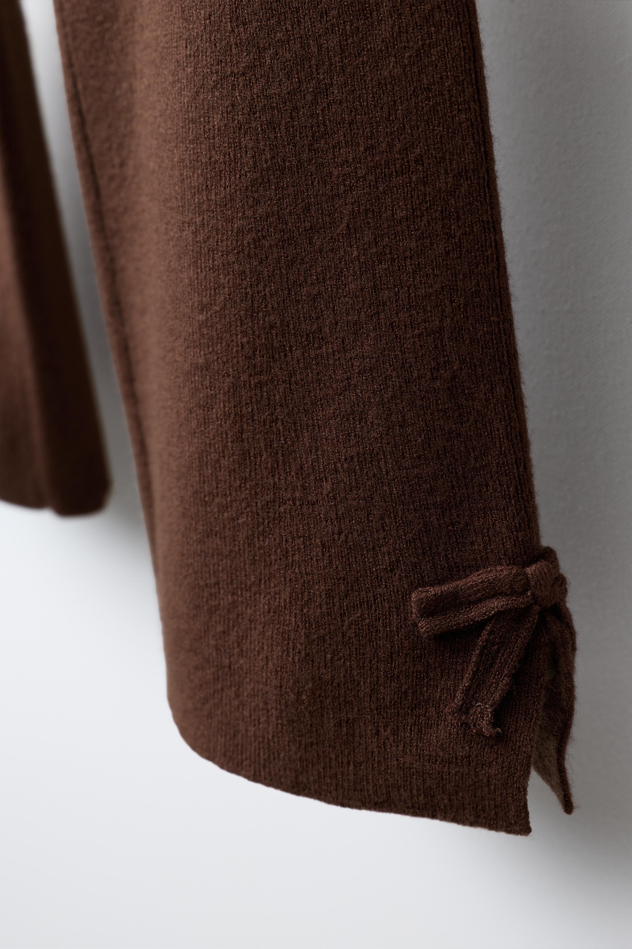 FLARE KNIT PANTS WITH BOWS