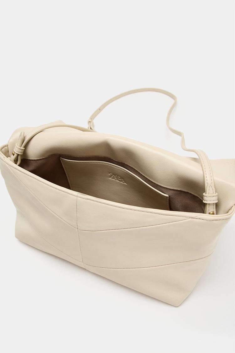 Bolso de mano tipo sobre acolchado 7