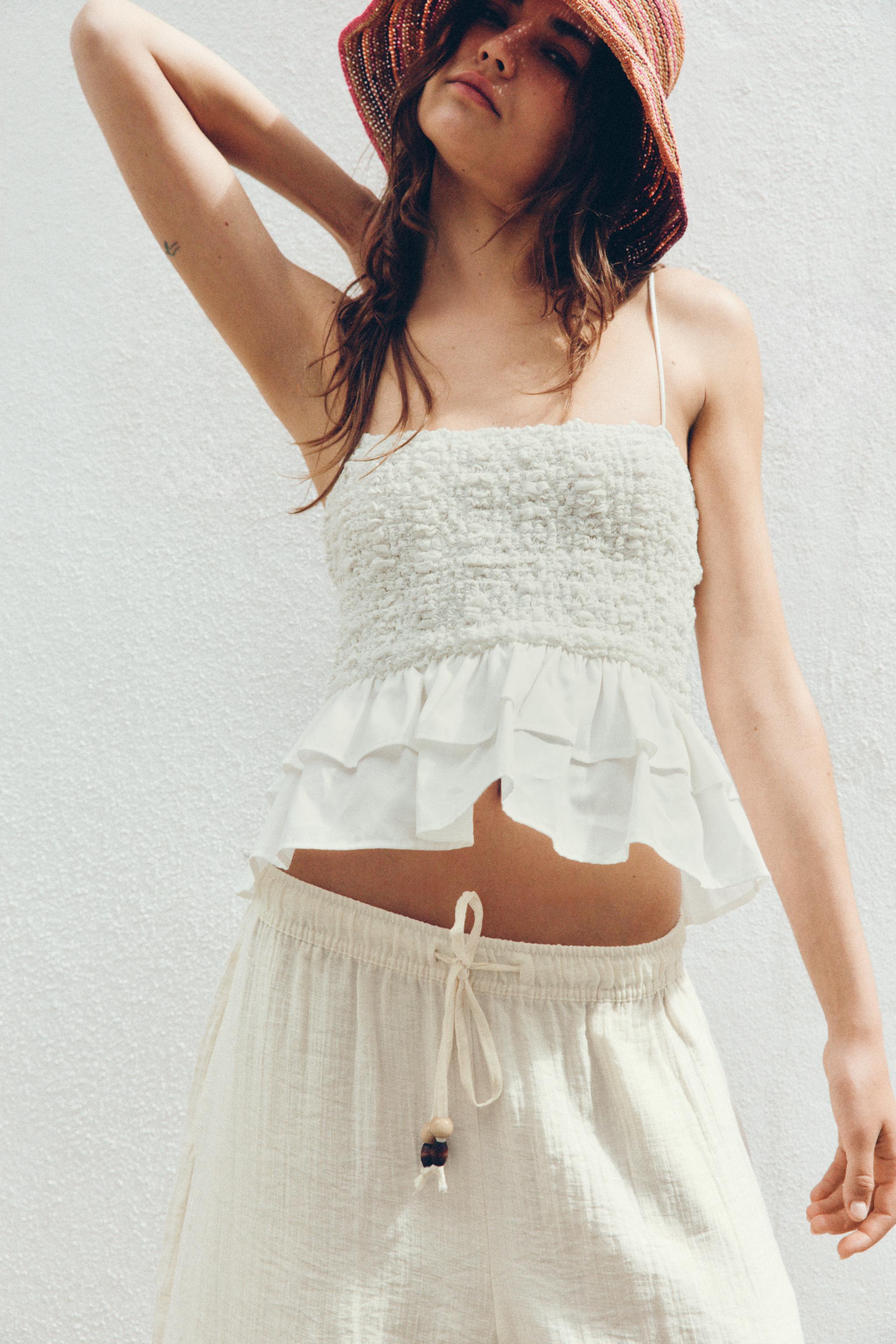 SMOCKED PEPLUM TOP — White
