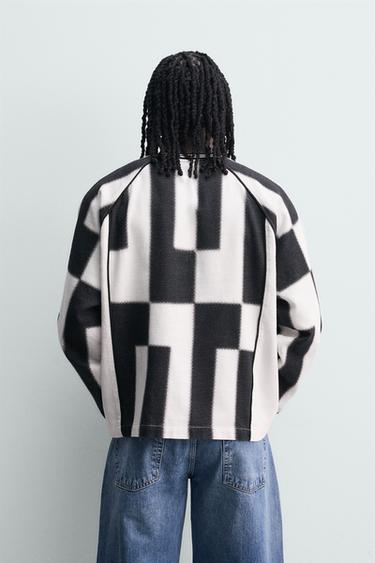 T-SHIRT EN JACQUARD À RAYURES STRUCTURÉ - Blanc / Noir de Zara - Image 2